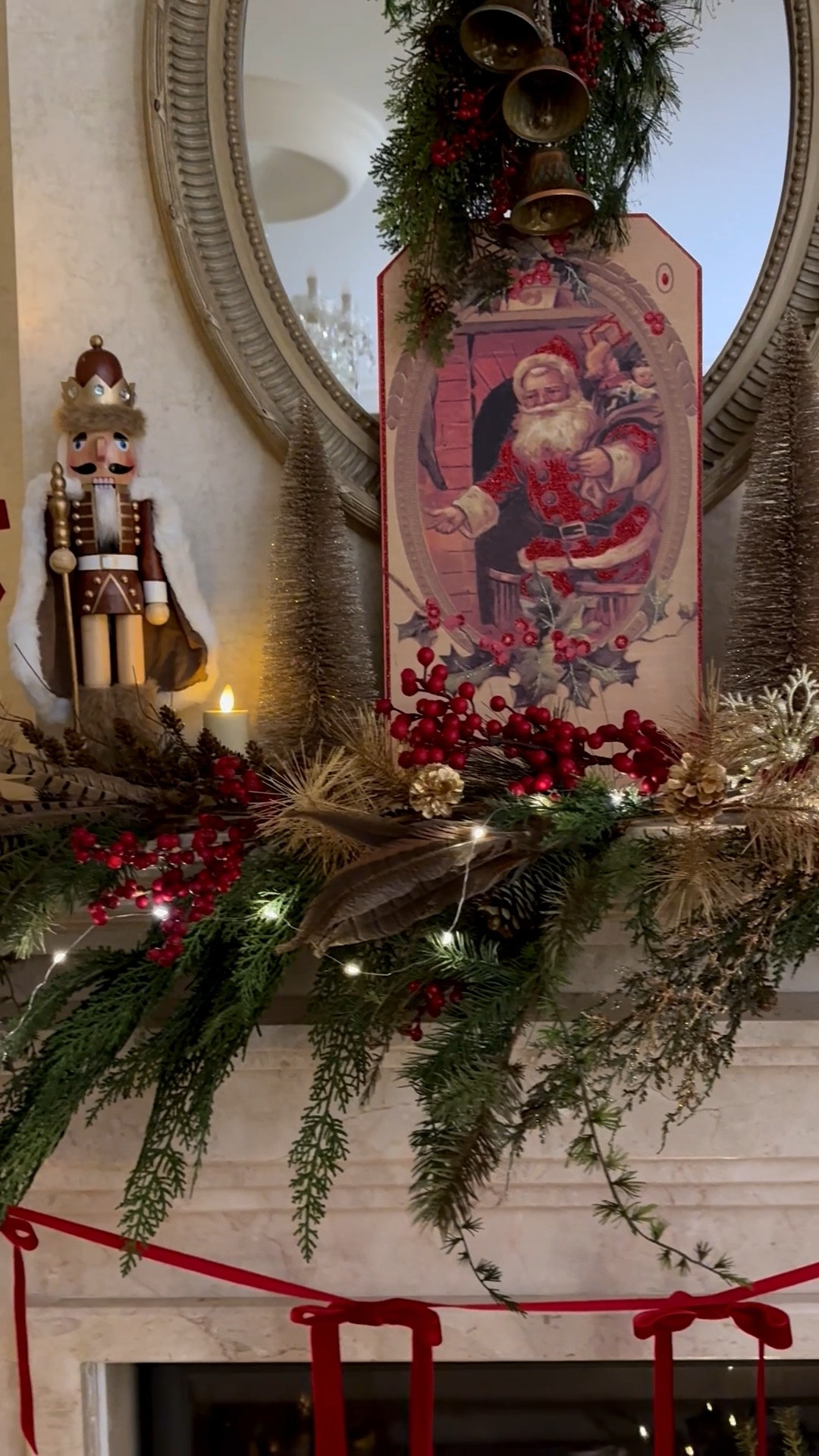 Christmas living room mantel decorations, traditional Christmas tree decor with red, green and gold, red velvet bow garland, Santa sign

#LTKFindsUnder50 #LTKHome #LTKHoliday