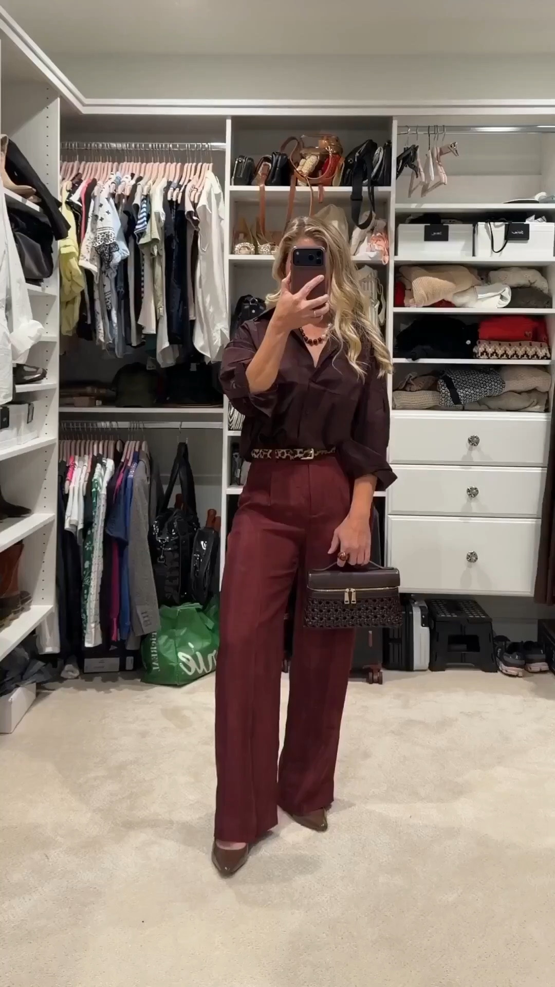 Outfit inspo 🤎

Loving rich, moody tones. I paired a chocolate poplin shirt with bordeaux satin wide leg pants and added a leopard belt for a little personality. Finished it off with a woven top-handle bag, block heels, and a few favorite jewelry pieces to tie everything together.

Styling tip: when your outfit leans neutral, add one patterned accessory like a belt or bag to create depth without overpowering the look.

Everything is linked below ✨

#LTKPetite #LTKootd #LTKWorkwear