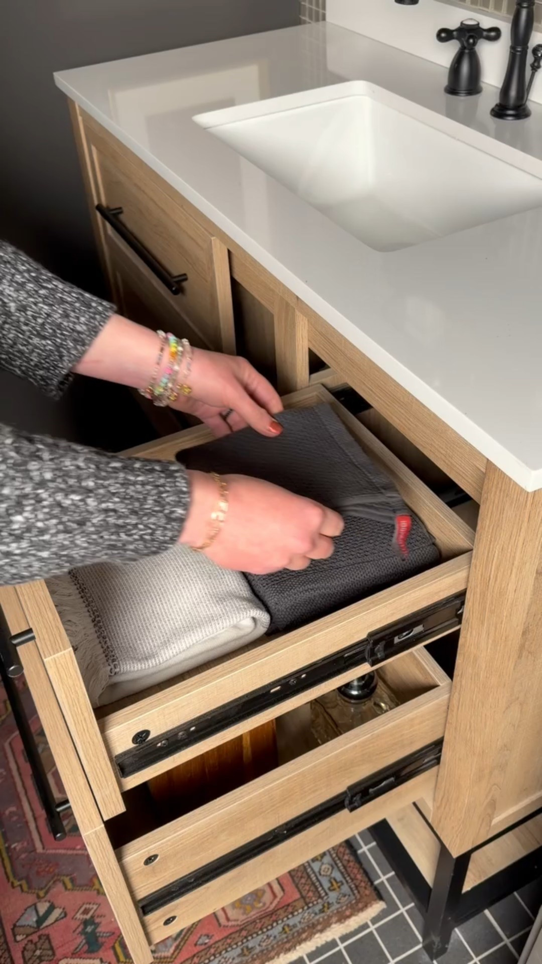 A bathroom vanity that proves thoughtful design is in the details ✨
This wood bathroom vanity features soft-close drawers, black hardware pulls, and a sleek integrated white countertop sink for a clean, modern look. Inside the drawer, bathroom accessories like a wood tissue box, soap dispenser, and toilet paper storage are neatly organized—functional, beautiful, and intentional. A timeless bathroom vanity collection that balances storage, organization, and style effortlessly.

https://creators.homedepot.com/mypage/Eanesinteriors/collections/18636

#eanesinteriors #bathroomvanity #bathroomvanitycollection #bathroomfurniture #bathroomstorage #vanitydrawer #bathroomorganization #modernbathroom #woodvanity #bathroomdetails #homeinteriors #ltkhome

#LTKSeasonal #LTKHome #LTKdayinmylife