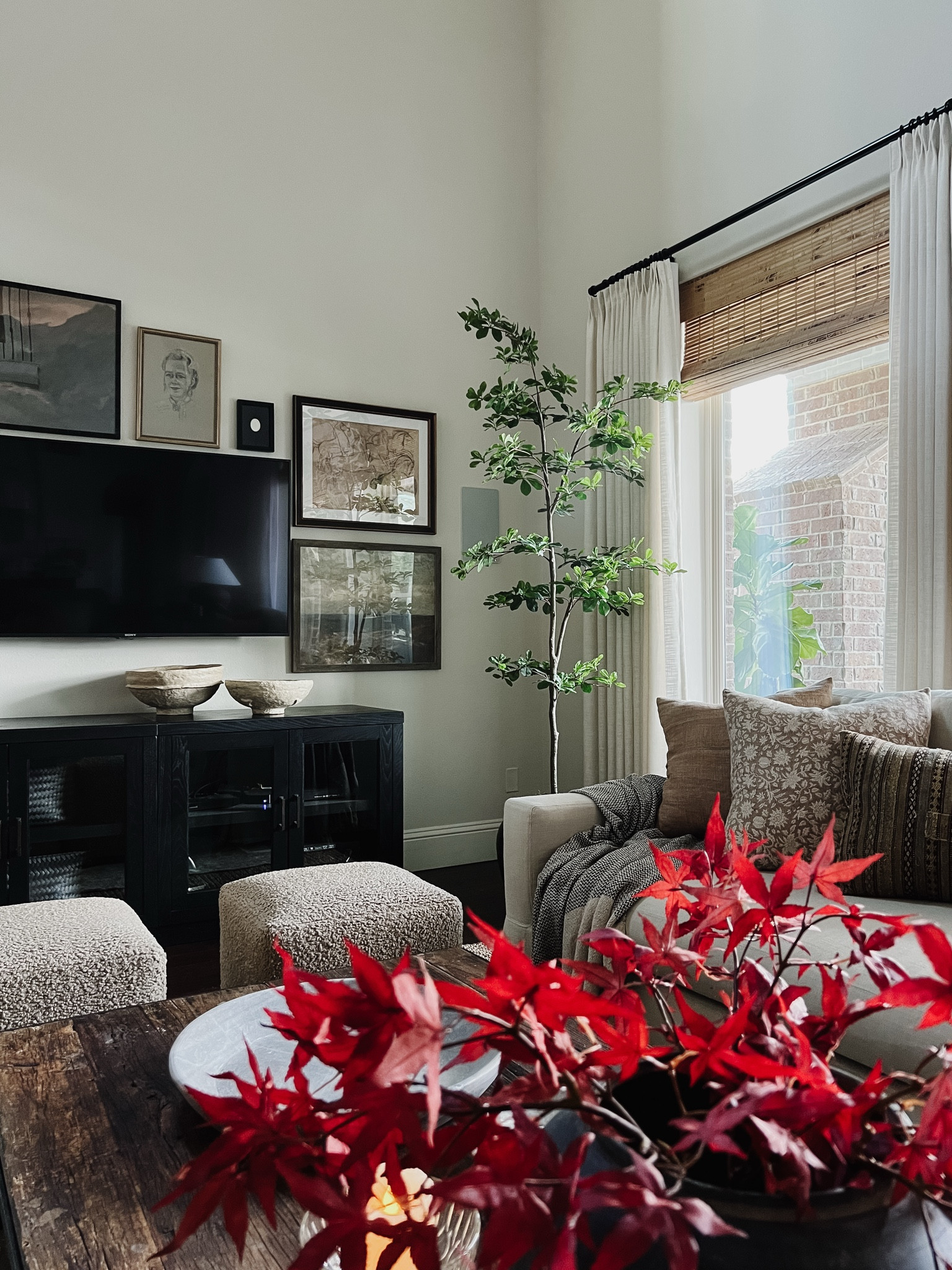 Neutral gallery wall, faux fall stems, vintage paper mache bowls, faux black olive tree



#LTKHome