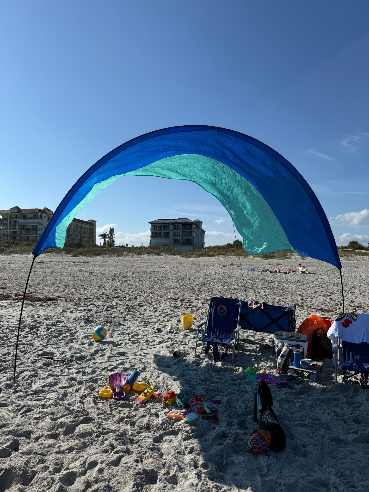 We use our Shibumi Shade EVERY single time we go to the beach 🏖️
It weighs just 2.5 lbs, sets up in seconds, and actually works with the wind. The Quiet canopy is a game changer (way less flapping), and I just snagged the Wind Assist too — it packs light and is perfect for low-wind days.

Bonus: it’s airplane-friendly, so it can come with you for spring break ✈️☀️
Hands down one of our most-used beach essentials.

#LTKGiftGuide #LTKActive #LTKTravel