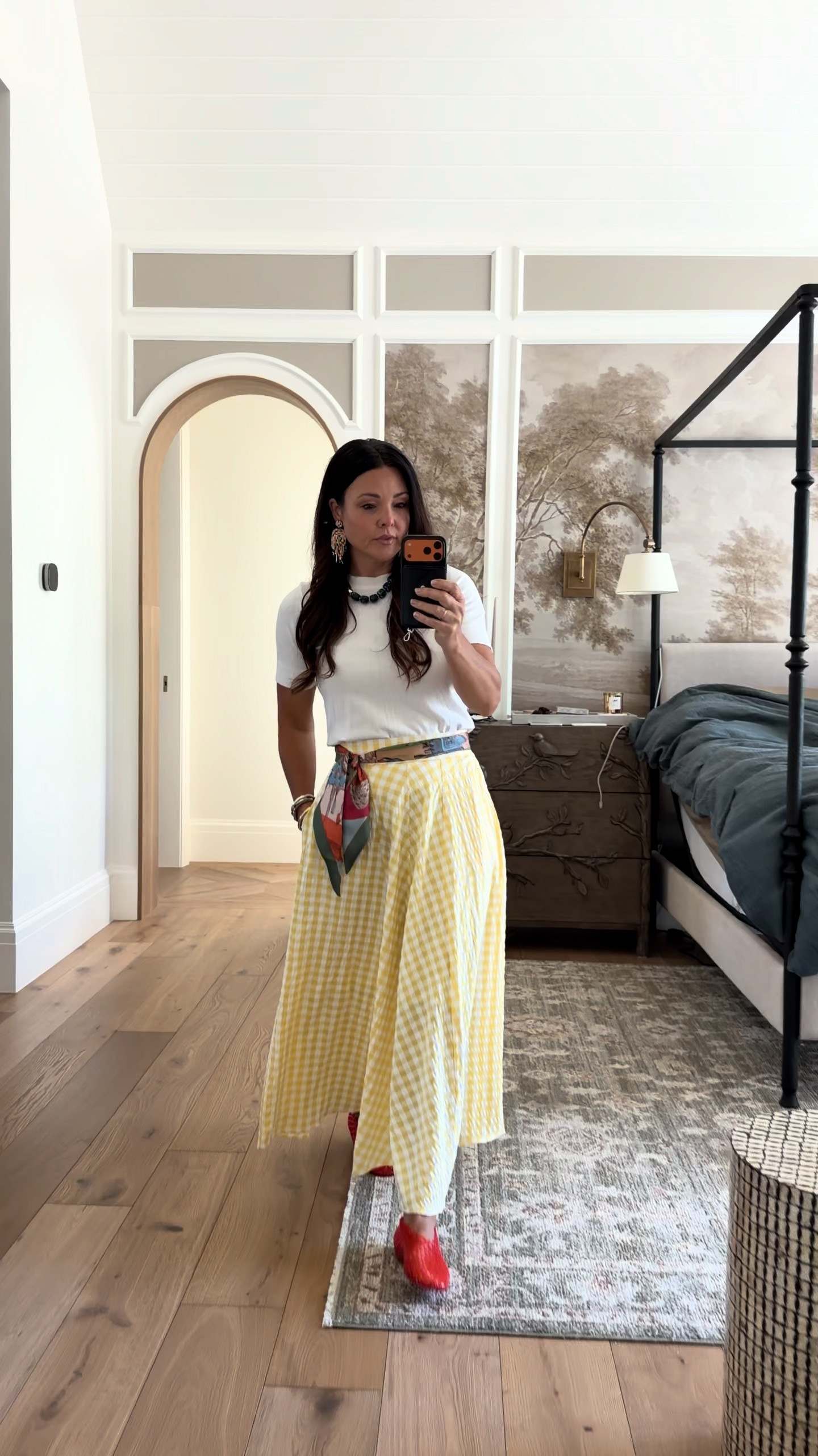 Colorful Amazon summer outfit. Gingham Yellow skirt. Basic white tee. Red jelly shoes. Chunky necklace. Statement earrings. Colorful Scarf. 

 