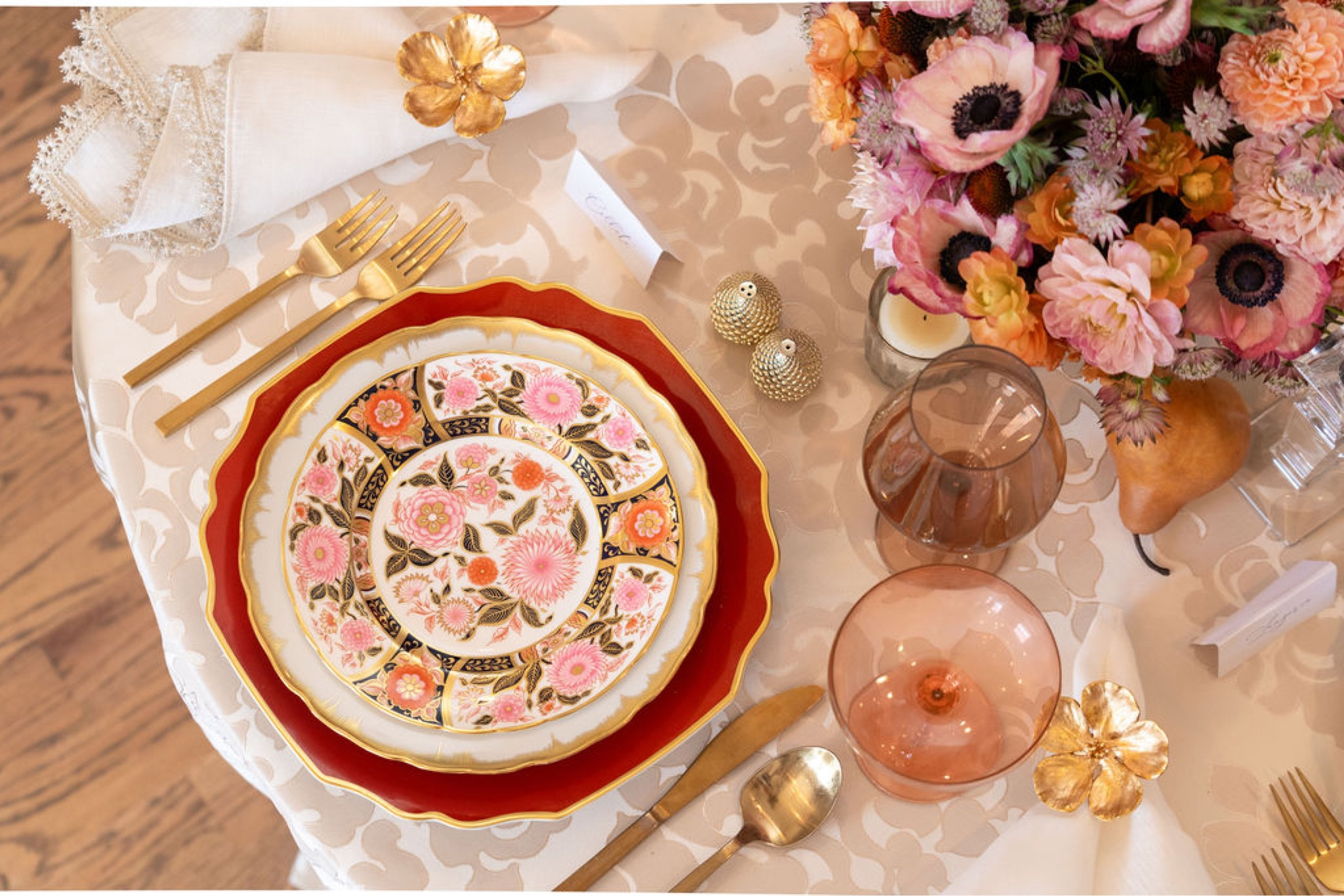 Celebrate a milestone birthday or anniversary with these beautiful rose medallion plates. This elegant and chic table is colored in rose gold and pink hues and the beautiful pink and gold tableware of this table is sure to impress. FLORAL PLATES. GOLD TABLEWARE. FLORAL TABLEWARE. PINK GLASSWARE. BLACK CANDLESTICKS. GOLD FLATWARE. 

#LTKparties #LTKhome #LTKSeasonal