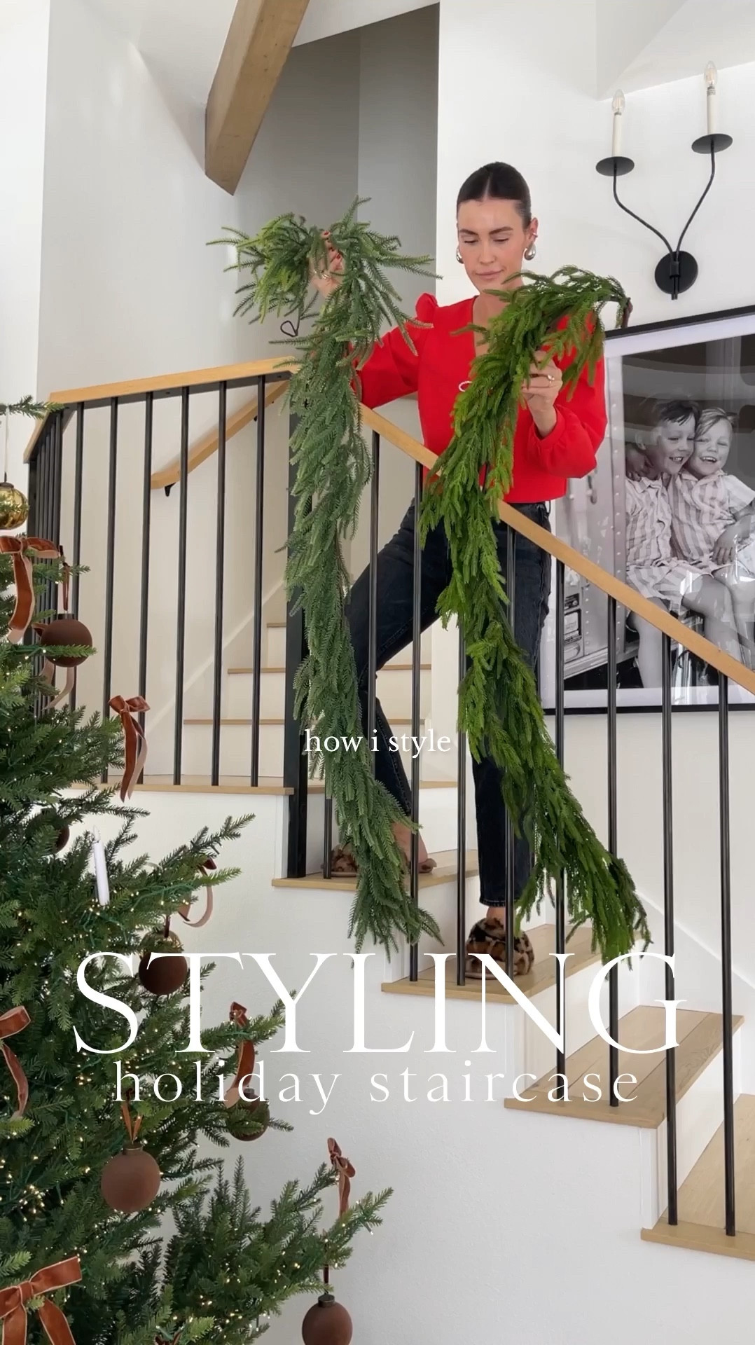 HOLIDAY \ layered garland staircase styling✨ This year I wanted a really full look so I mixed Amazon and Afloral garlands. Essentially I layered three on top of each other in the two sections of the staircase, and added one more down the front of the railing! Next up I added a set of cow bells, velvet bow throughout and wooden beads✨ I made sure everything stayed in place using zip ties👌🏻🧑🏻‍🎄 Looooooving it! I may add on some twinkle lights next✨✨

#LTKHoliday #LTKWatchNow #LTKHome
