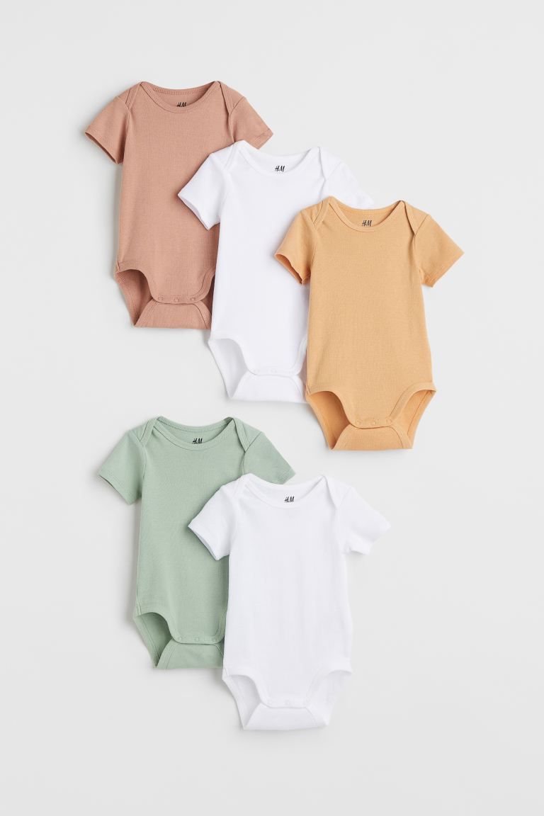 Conscious choice  Short-sleeved bodysuits in soft cotton jersey with lapped shoulders and press-s... | H&M (US + CA)