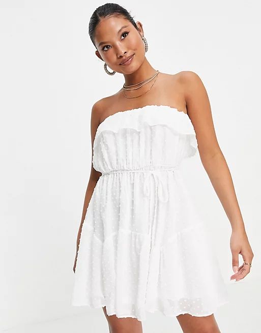 ASOS DESIGN Petite ruffle bandeau mini skater dress with belt in textured in ivory | ASOS (Global)