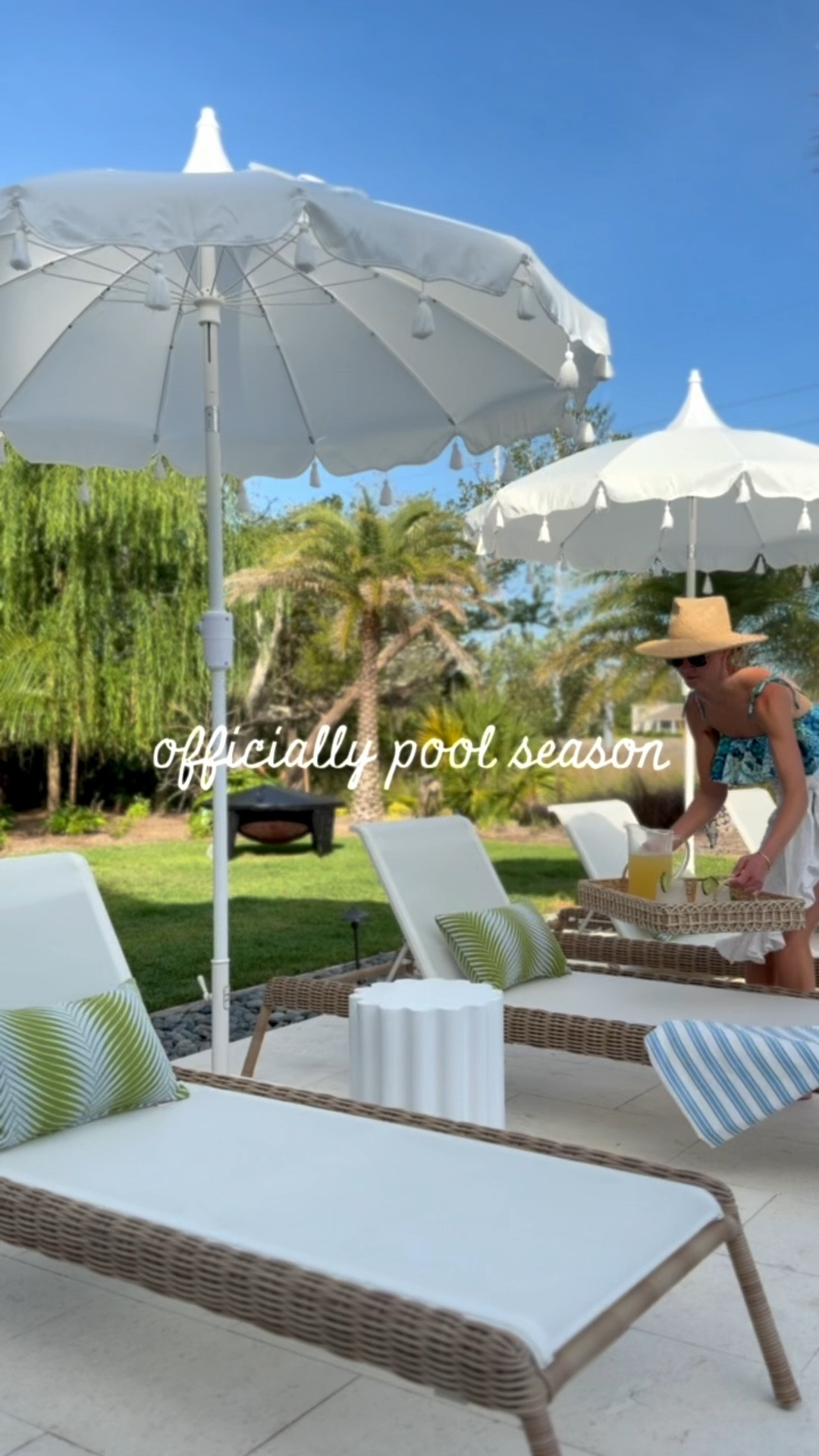our little poolside refresh is finally coming together and these @wayfair finds have been some of my favorite additions for summer ✨ the umbrellas completely transformed the space… made with Sunbrella fabric, finished with the prettiest tassel + pagoda detailing, and they truly look far more expensive than they are. we paired them with our Business & Pleasure bases with casters and love how sturdy and functional they feel.

also very into all of the smaller details that make everything feel layered and finished — the scalloped accent tables, palm-trim pillows in the prettiest coastal color palette, striped Turkish towels, and the beautiful Juliska serving pieces we’ve been using nonstop for poolside drinks + snacks. the acrylic pitcher + tumblers especially feel elevated while still being practical for outdoor living.

these are the kinds of pieces that make slow summer afternoons, easy hosting, and time spent at home feel extra special ☀️ #AD #WayfairPartner #Wayfair

#LTKSeasonal #LTKHome #LTKSaleAlert