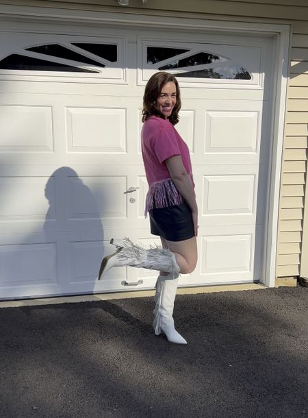 Country concert outfit Pink fringe crop top (size small). Black Leather skirt (size 4). White fringe boots (size 8.5). Bralette (size medium). #countryconcert #countryconcertoutfit #concertoutfit #pinktop #croptop #pinkfringetop #leatherskirt #skirt #boots #whiteboots #fringeboots 

#LTKSeasonal #LTKstyletip #LTKunder100