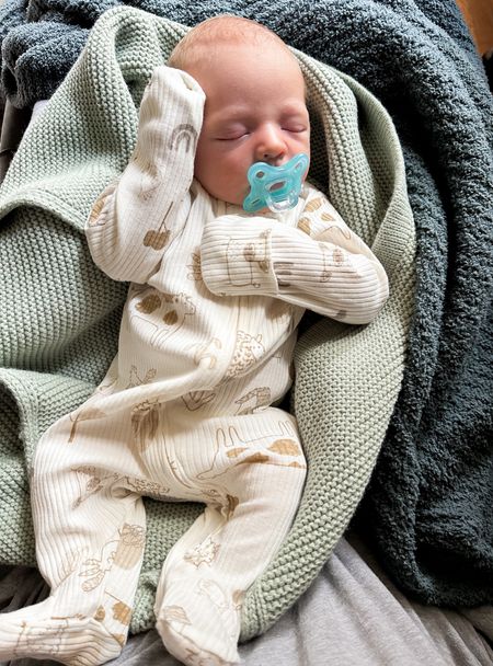Baby boy onesie is half off today ($9), and knit baby blanket is a target find 

Sleep and play onesie


#LTKbaby