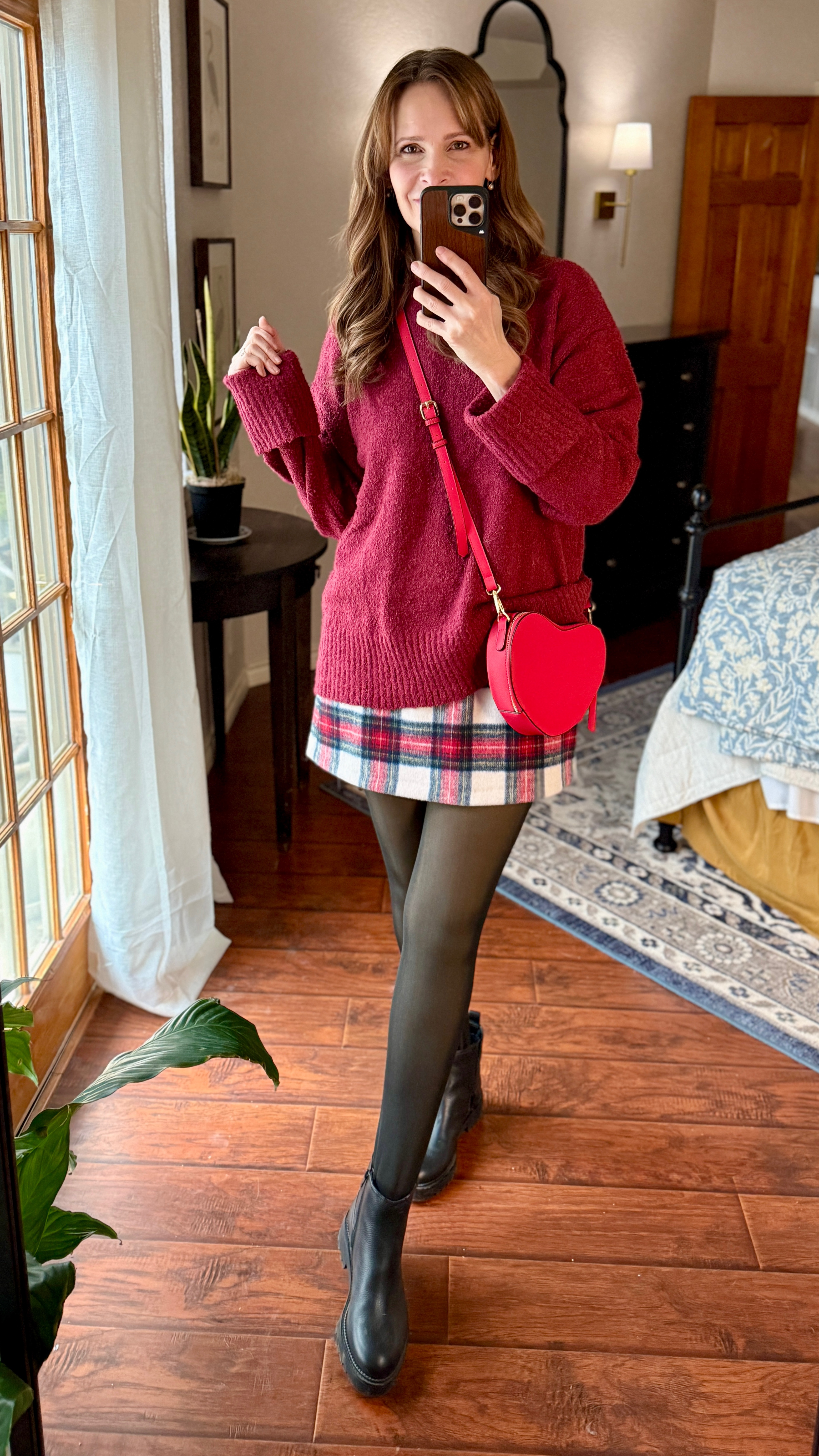Changed my boots 5 times and settled on these for comfort.  Fleece leggings are super warm. Skirt runs large but still love it. Had fun trying different tops with this skirt because so many looked good but since Valentines is around the corner I’m going with the reds.

#over50 
#fashionover50

#LTKFindsUnder100 #LTKStyleTip #LTKSeasonal