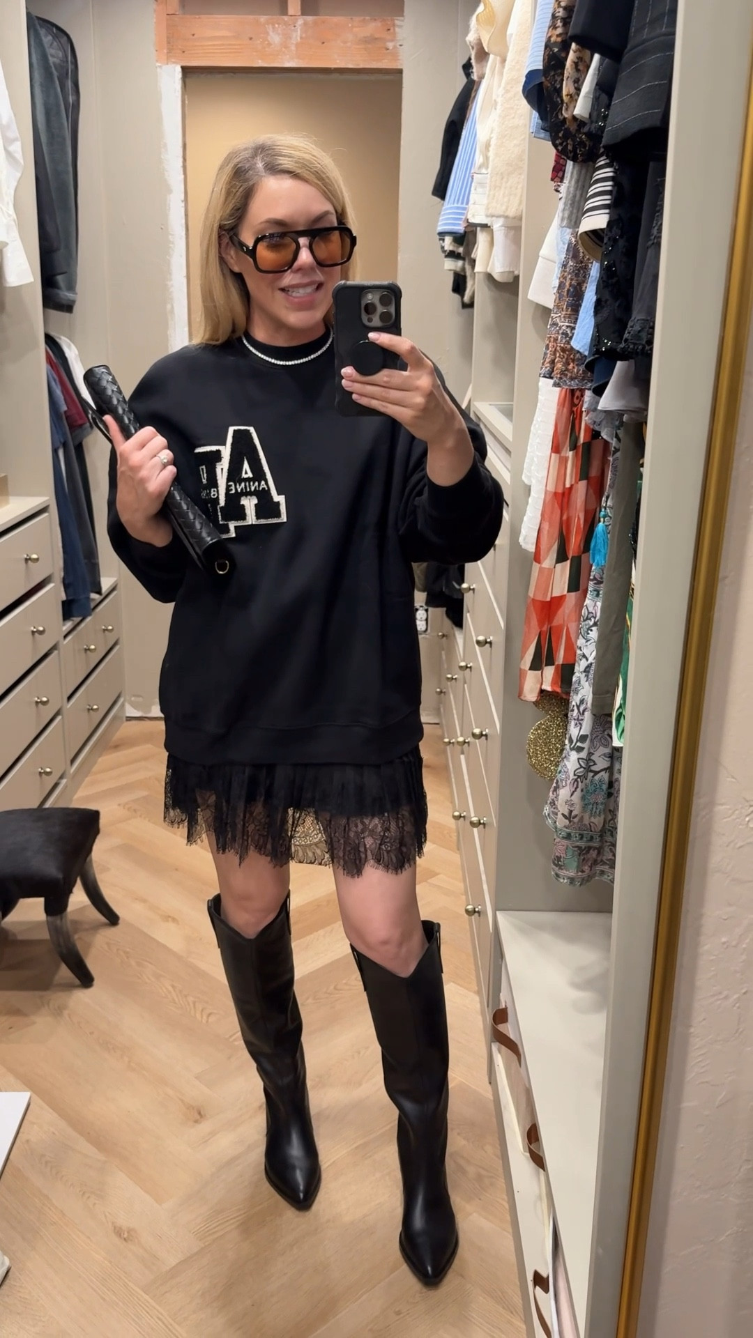 Anine Bing sweatshirt 
Lace skirt
Western boots 

#LTKSeasonal #LTKFindsUnder50