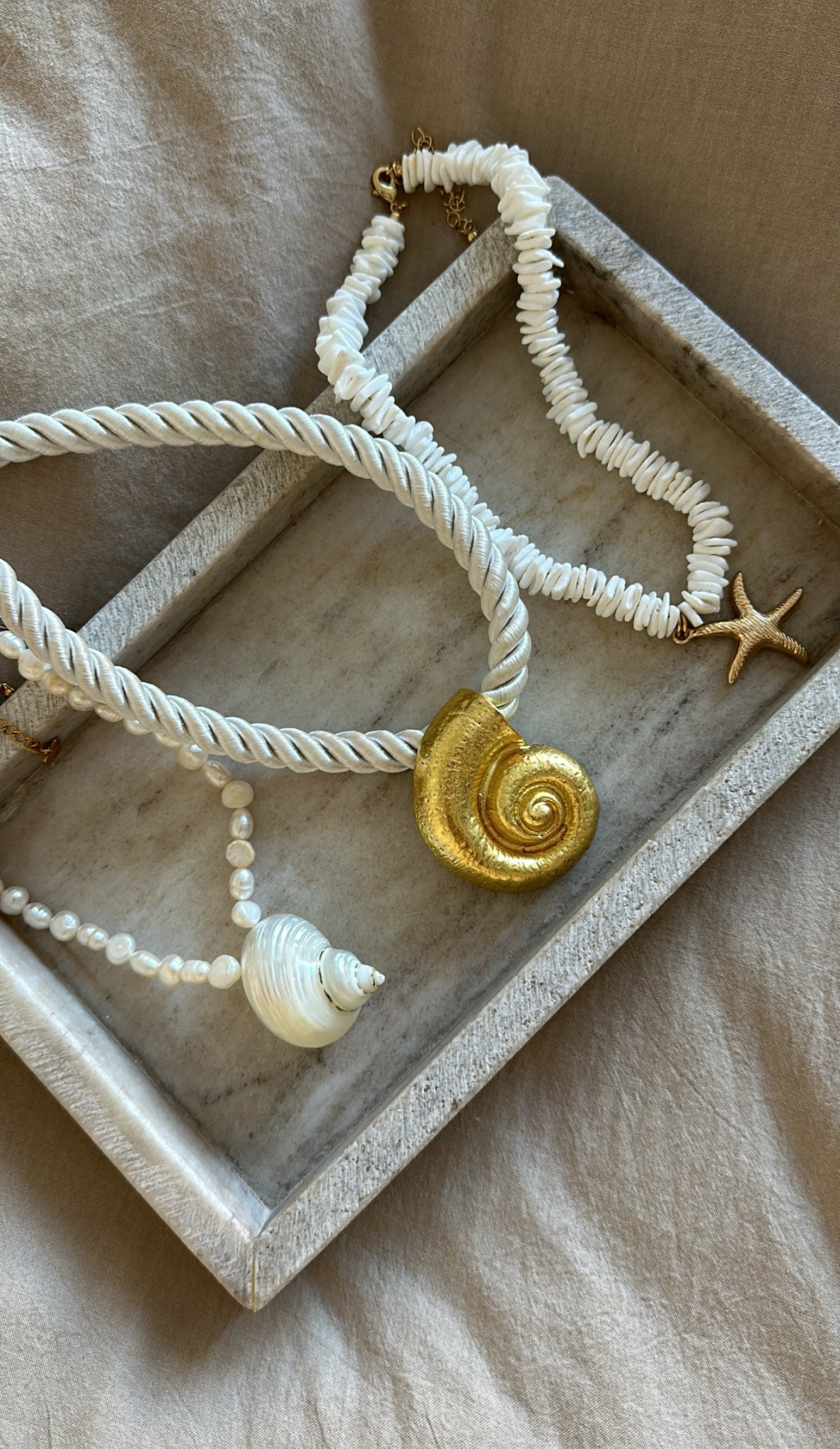 Fun beachy shell necklaces 

#LTKSeasonal #LTKFindsUnder100 #LTKStyleTip