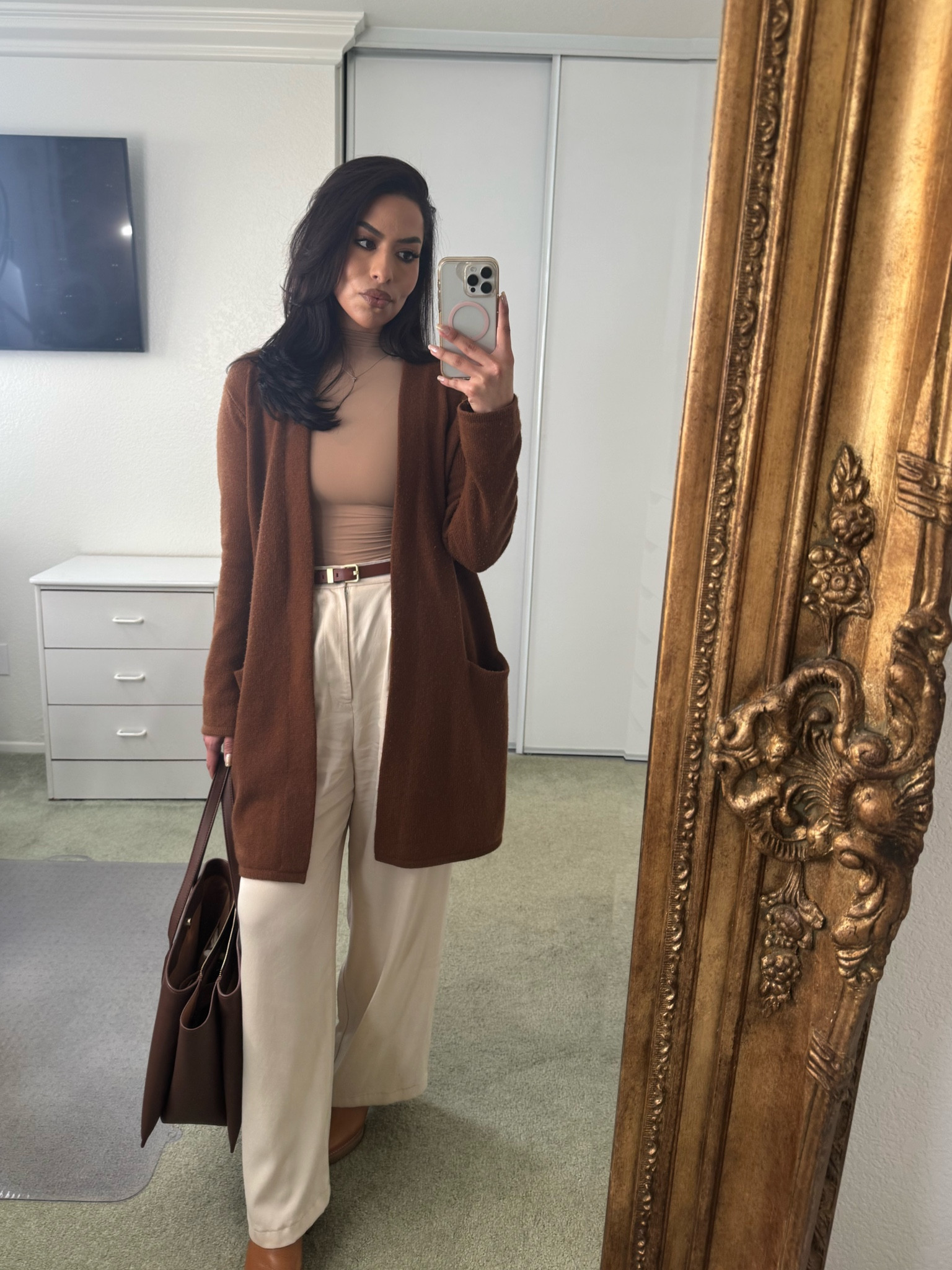 These pants from Reformation are so comfy! I love how they can be dressed up or down and come in tons of colors.

I’m also obsessed with this sweater coat from Jenni Kayne. I love it so much, I have 5 of them in multiple colors🤭. I even keep one at work so I’m always cozy at my desk when I take my blazer off. 

I always get tons of compliments on these boots! They are perfect if you like a high heel but want to be comfortable walking in them all day. They keep my feet warm in the winter, too! I have them in black and brown. 🤎🖤

#LTKStyleTip #LTKGiftGuide #LTKWorkwear