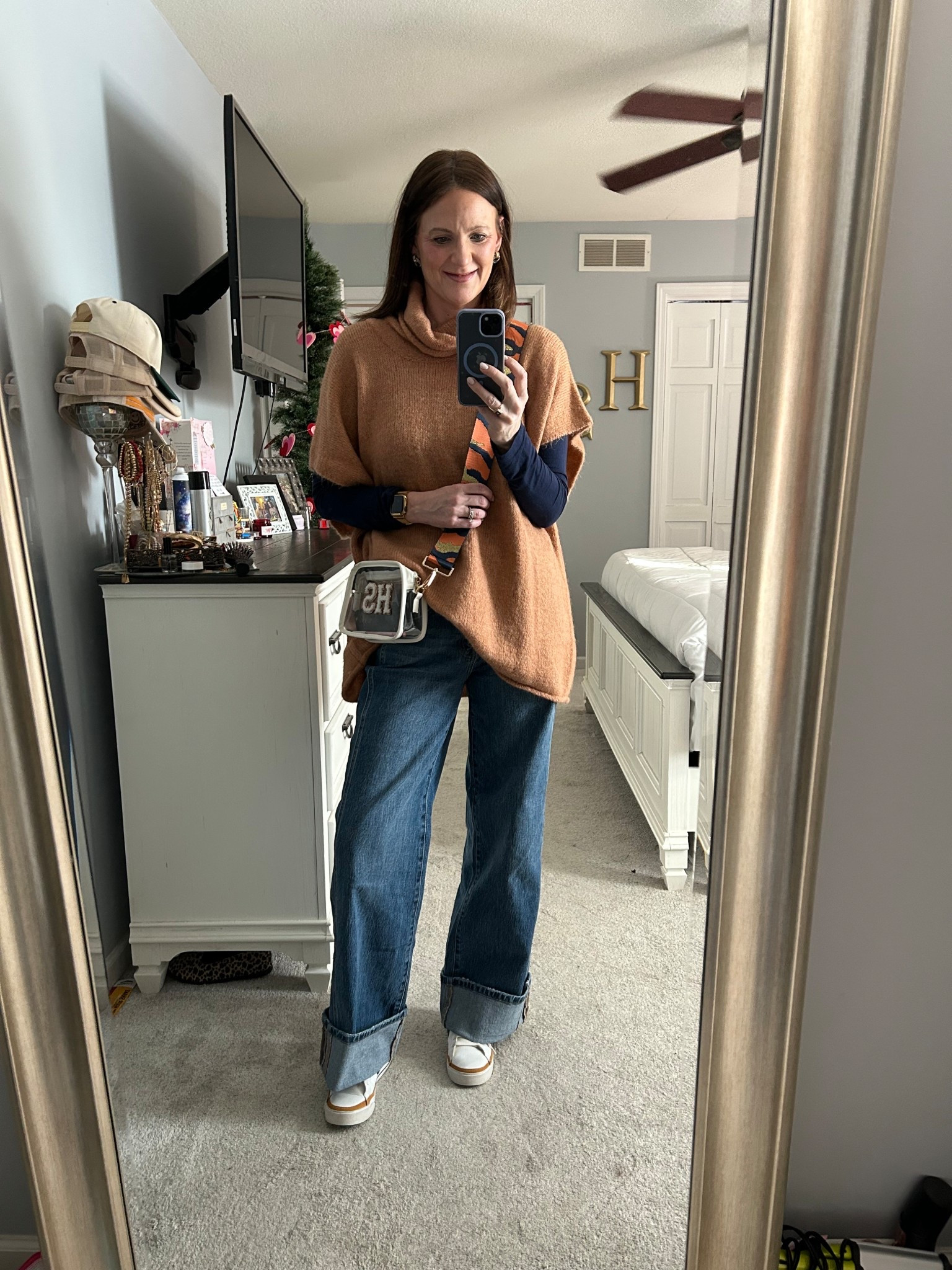 Saturday’s ootd for an Illini 🏀 WIN! It was freeezing 🥶 that day so wearing all the layers was a necessity. Most of this outfit is older from my closet so I tried to link similar items to re-create this look. This stadium bag is customizable and a must for any game or concert. 

Game day outfit, football game style, tailgate outfit ideas, sporty casual look, comfy game day fit, team color outfit, stadium outfit inspo, oversized sweater outfit, cuff jeans, cuff denim, casual weekend outfit


#LTKootd #LTKdayinmylife #LTKOver40