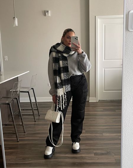Soft braided scarf. Neutral outfit. Cargo pants. Cargo pants outfit. Outfit inspo. Streetwear inspo. Black and white outfit. 

#LTKitbag #LTKfit #LTKstyletip