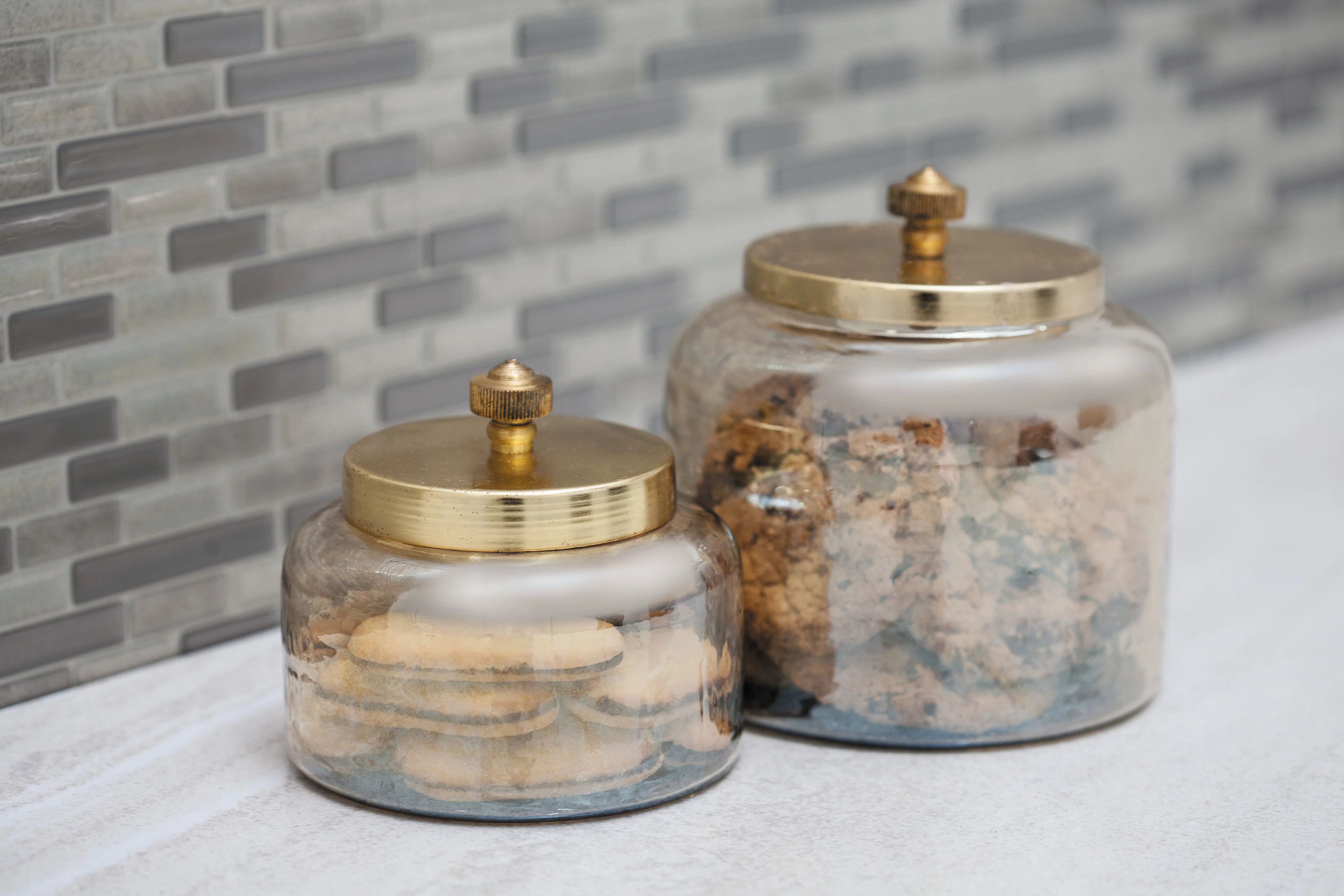 CosmoLiving by Cosmopolitan Small, Round, Decorative Gold Smoked Glass Jars with Bronze Metal Lid... | Walmart (US)