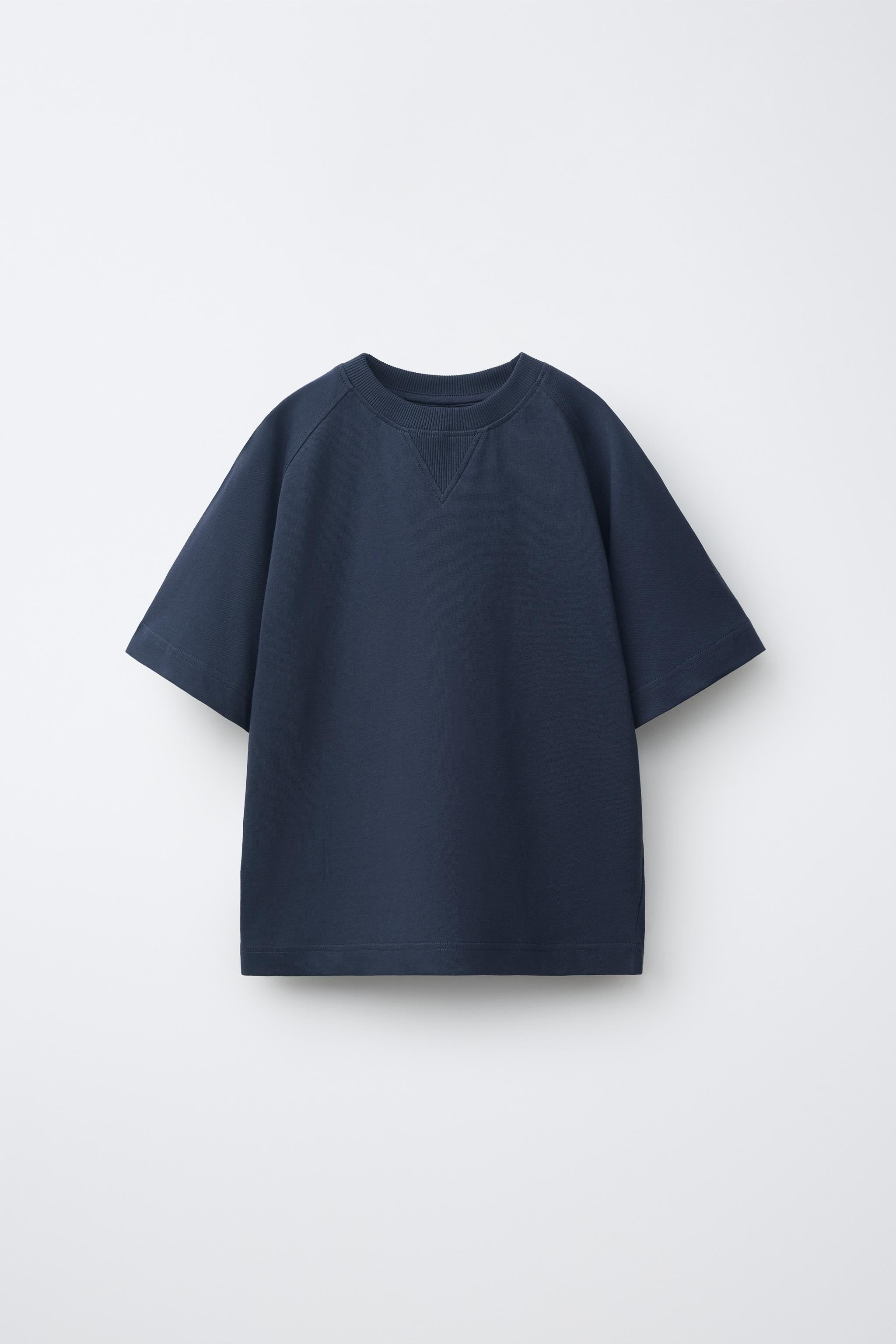 Two-piece set. Round neck short sleeve T-shirt. Shorts with elastic waistband and adjustable fron... | Zara US