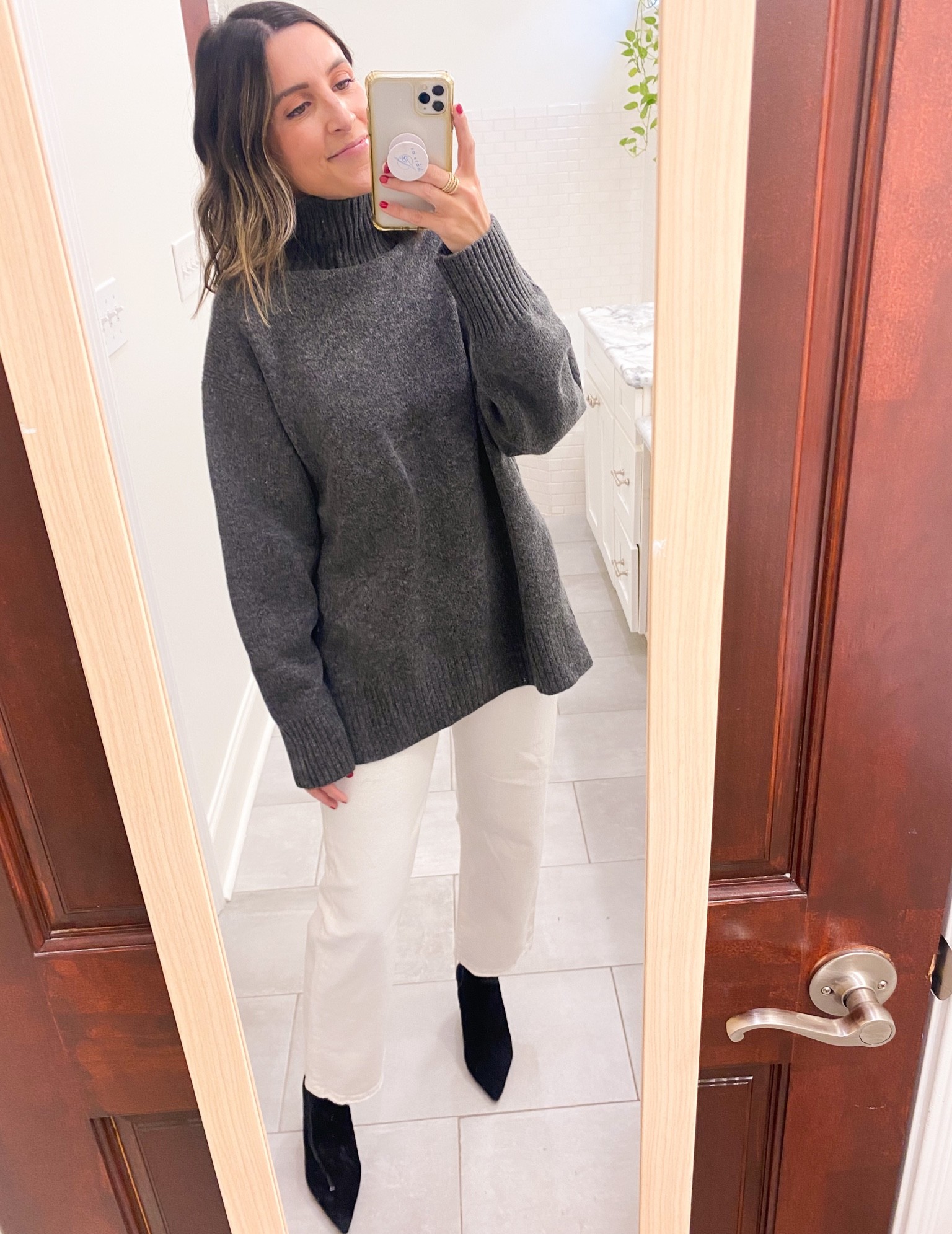 Sweater is oversized - wearing XS. Love the slits up side. Great quality! Denim runs TTS. Wearing size 26  