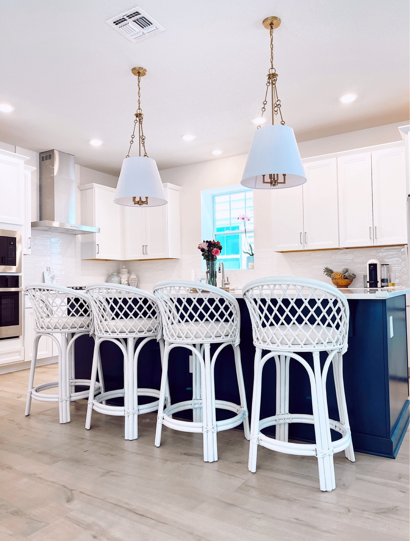 Kitchen // kitchen island // kitchen lights // counter stools // grand millennial // coastal 

#LTKhome #LTKSeasonal #LTKover40
