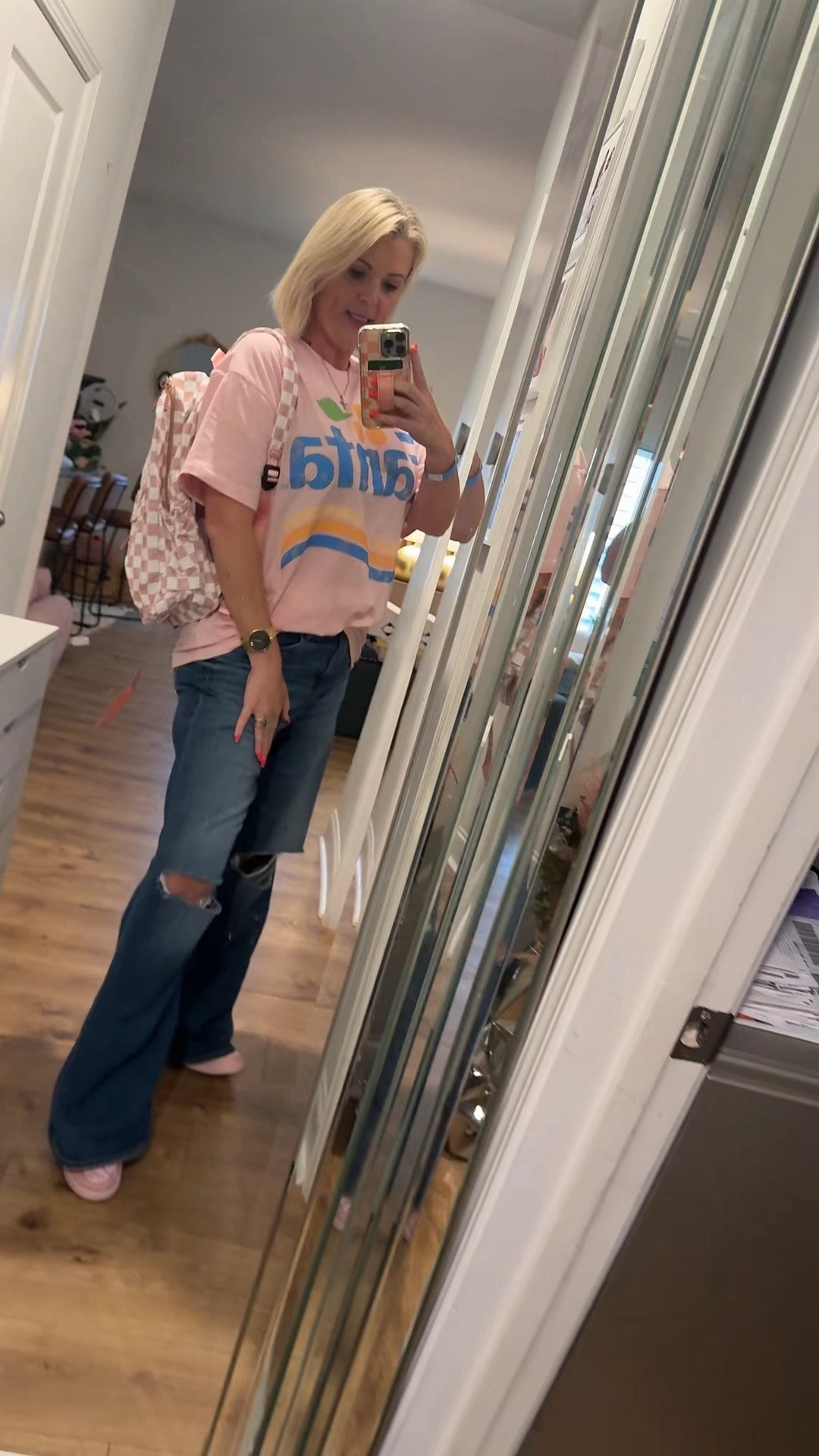 OOTD for the day! American eagle wide leg jeans // distressed jeans // checkered // BTS // back to school // graphic tees // Nike dunks // pink // womens fashion 

#LTKsalealert #LTKshoecrush #LTKkids