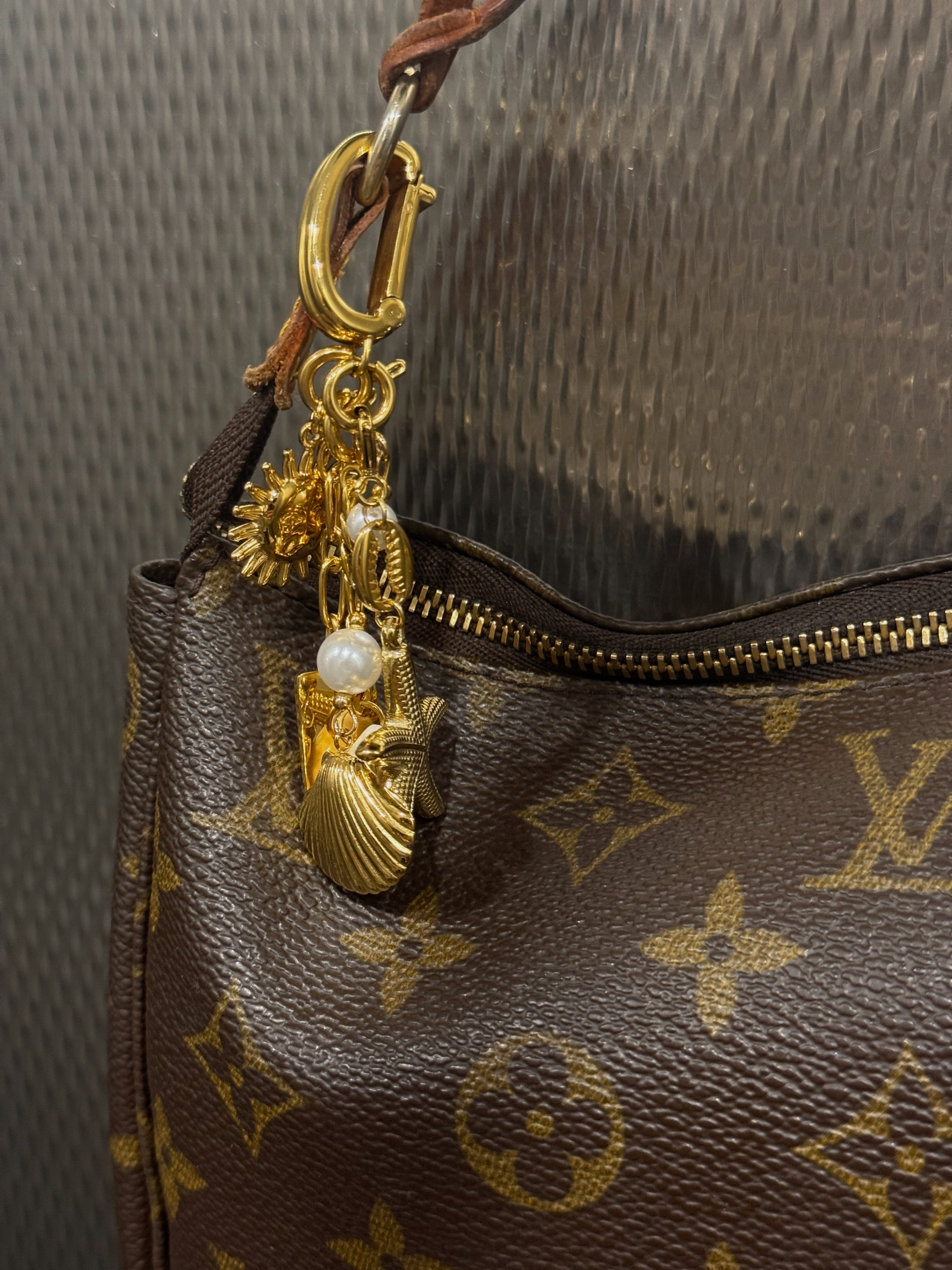 Purse Charm Details ✨ I love this trend of purse charms this summer. I want to have one for every single bag I own. These are actually ALCO's new bikini charms launching TODAY! I've linked them of course !!

#LTKSummerEdit

#LTKItBag #LTKFindsUnder100 #LTKTravel