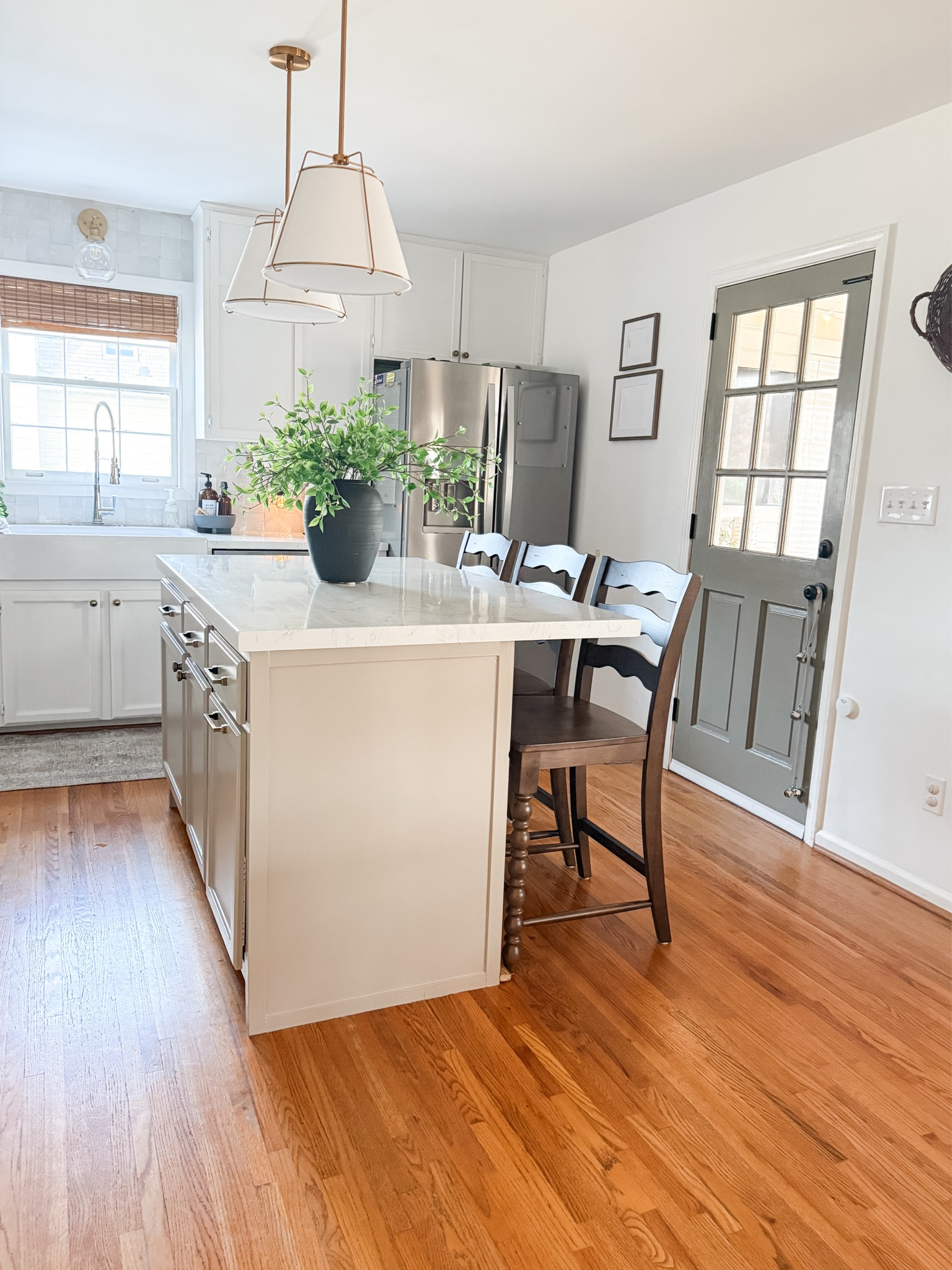 My new barstools
I wanted my kitchen dining chairs and barstools to flow better- the new barstools have the same dark wood tone as my dining chairs and I love that they aren’t a darker wood tone than my floors. They have spindle leg details and scallop back detail and are solid wood. Come as a set of 2. 
They are very sturdy and easy to  assemble and will quickly wipe clean! 

#LTKStyleTip #LTKHome #LTKFamily