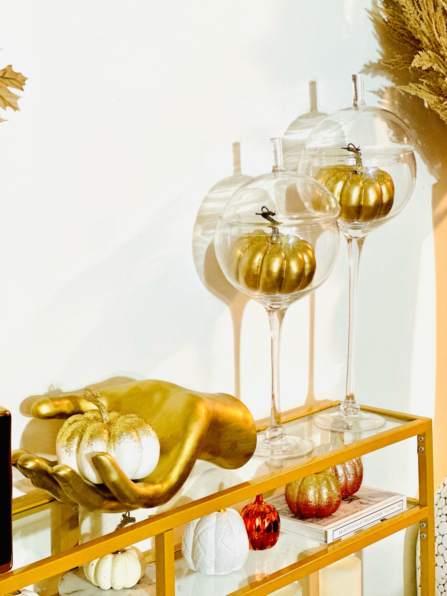 Fall Decor | I love styling my canisters with pumpkin to accent the fall season! I also added my beautiful gold sculptured hand to accentuate and pull the entire look together! ✨

#LTKhome #LTKstyletip #LTKsalealert