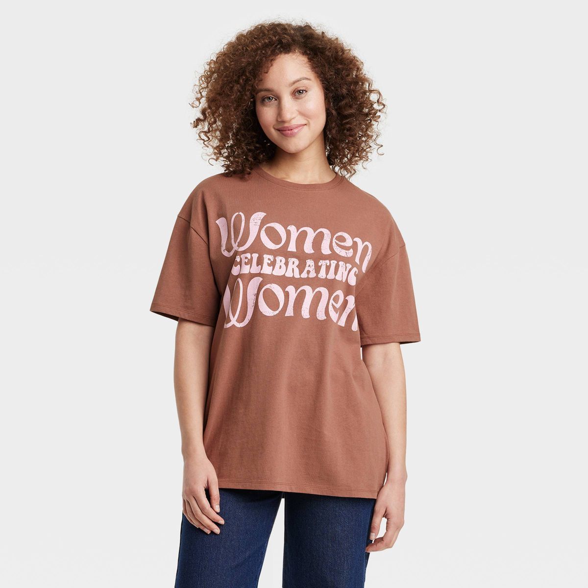 Women's Women Celebrating Women Short Sleeve Graphic Oversized T-Shirt - Brown | Target