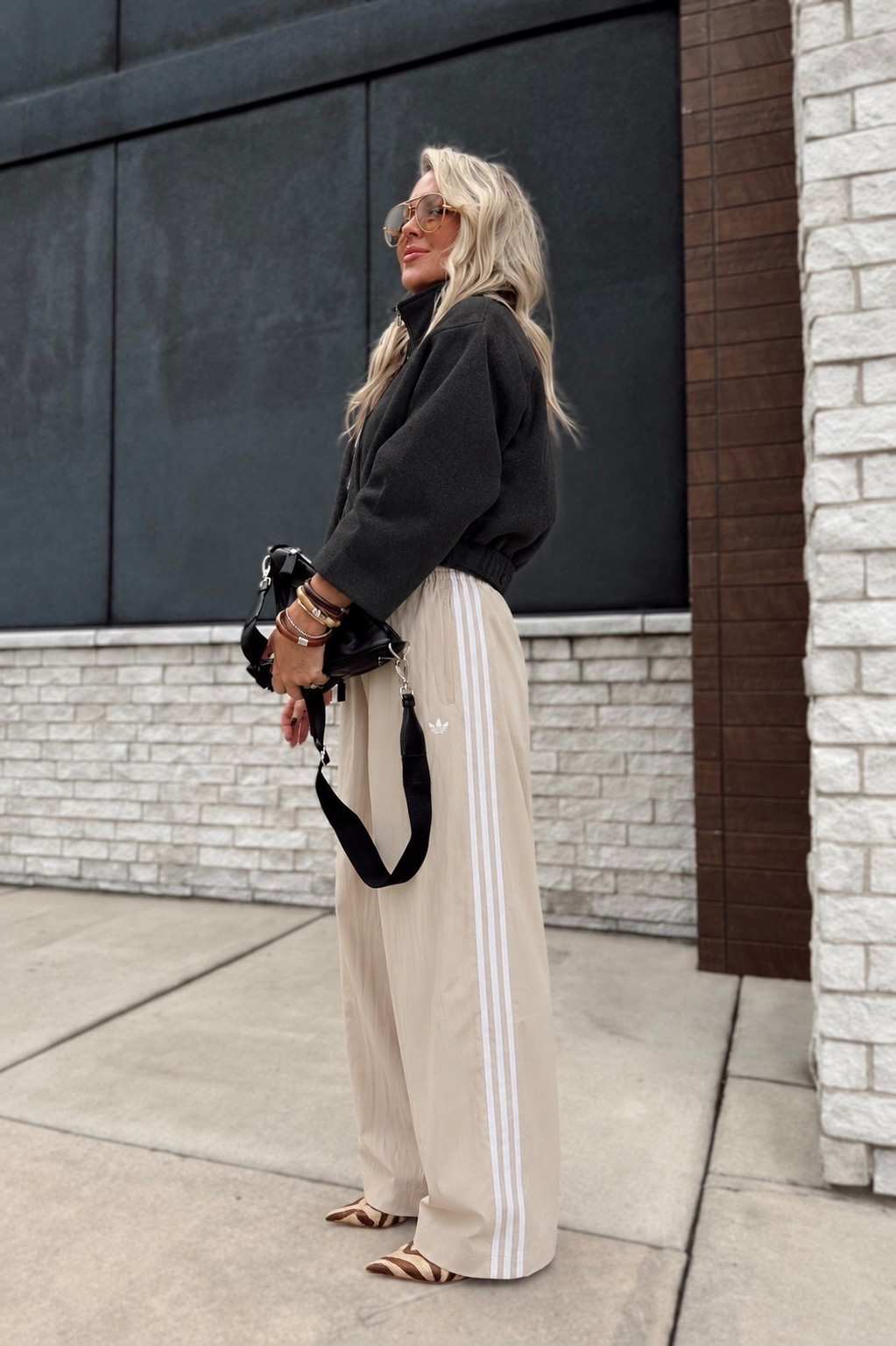 The sporty pants + polished jacket combo is IT 👏🏼 This Revolve jacket is NEW and these Adidas track pants are a NEW RELEASE + come in more colors! 🤎 And yes… I had to add the zebra heels. 👀

Adidas track pants, Revolve jacket, Adidas outfit, fall outfit, track pants