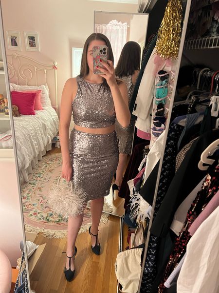 NYE outfit, New Year’s Eve, feather bag, sequin dress, platform heels, heels, party outfit, new years, holiday party, New Year’s Eve party, New Year’s Eve dress, silver sequin dress, black heels, feather clutch, silver skirt, sequin skirt, silver sequin skirt 

#LTKSeasonal #LTKparties #LTKHoliday