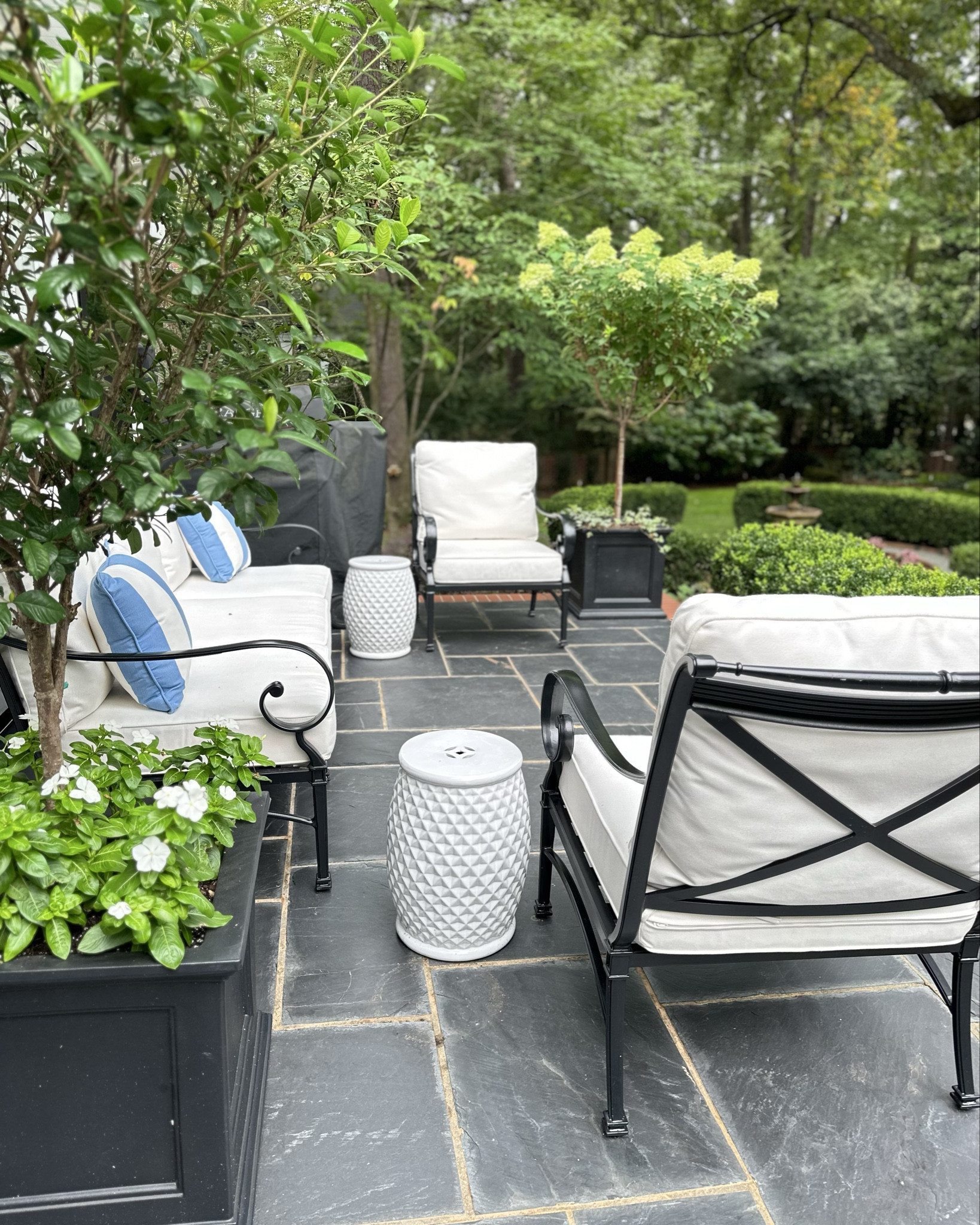 Patio furniture that can withstand the elements. Love the classic design and black finish on this outdoor set. It looks great with these large black planters and white garden stools. Great for morning coffee and enough seating for entertaining ✨

#LTKHome #LTKParties #LTKCyberWeek
