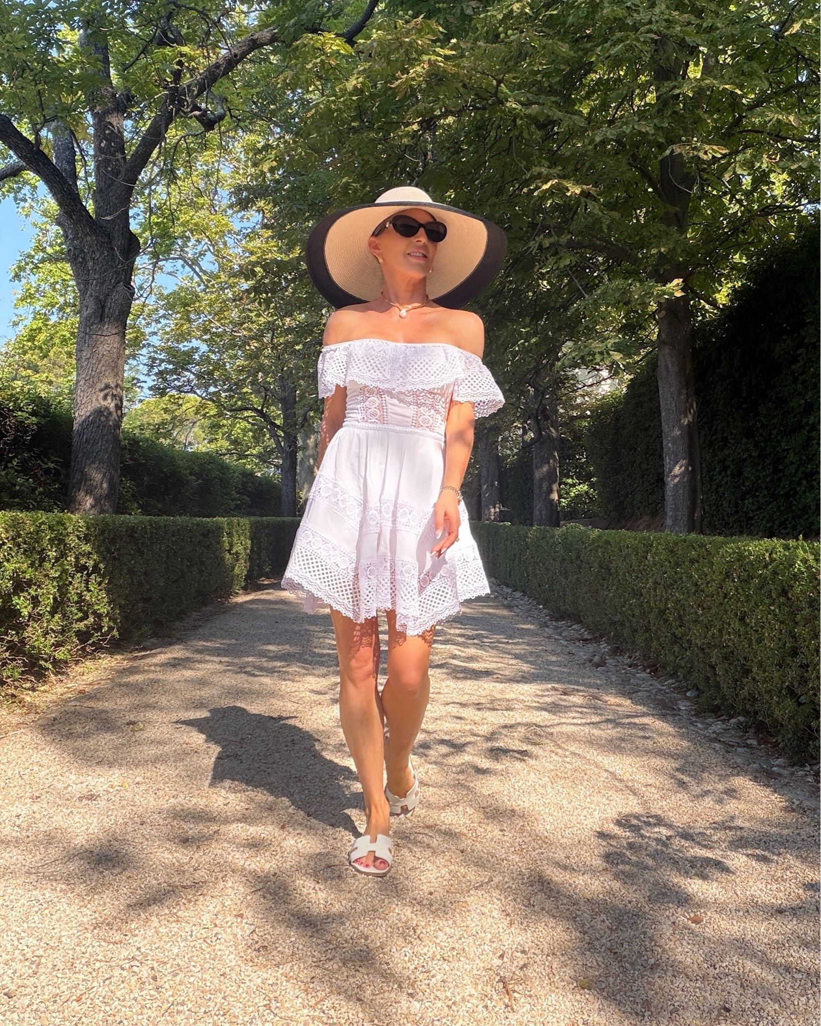 Summer outfit inspo: white mini dress, white sandals, and large sun hat

#LTKootd #LTKSeasonal #LTKTravel