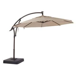 11 ft. LED Round Offset Outdoor Patio Umbrella in Sunbrella Sand | The Home Depot