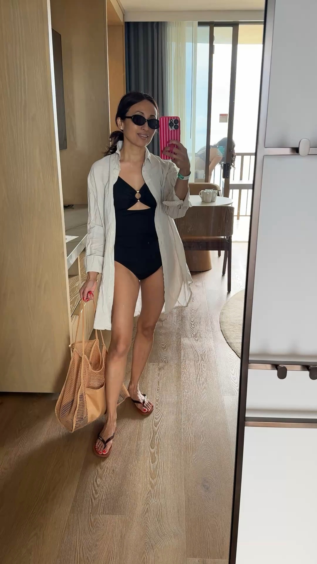 My classic pool outfit and beach outfit. I have had this swimsuit for years. They still make it and I have linked the new version. I have also had this swimsuit coverup for years. It’s my favorite and I will be buying another as a back up. Comfy flip flops also are from past seasons and are still available. Mesh beach bag is probably the oldest item here, but still works out great. 
The only thing new here is my sunglasses and I love them!  Look chic and great quality  

#LTKSwim #LTKOver40 #LTKTravel