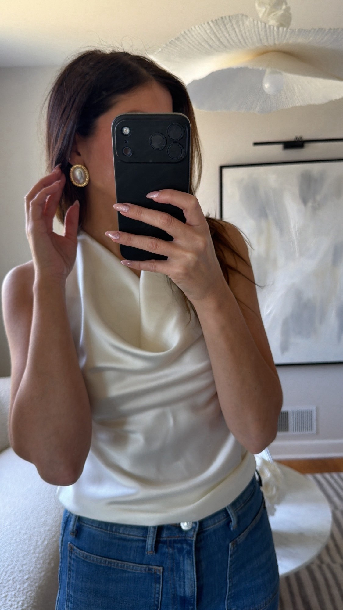 I have been really into silk blouses, and linked some that I like below since mine is not available online. White oval, oversized, earrings, date, night, dressy, spring, summer.

#LTKMothersDay