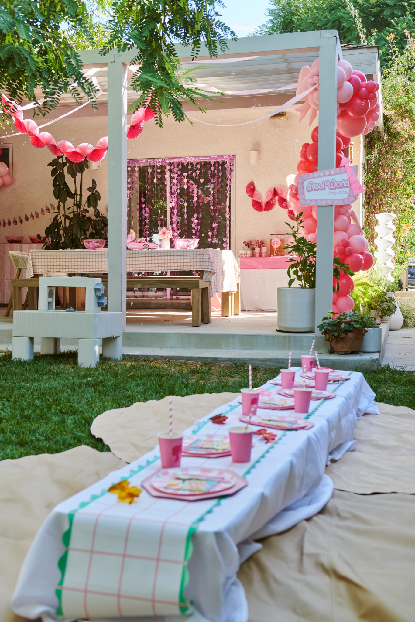 izzy’s barbie party 💕🌸🎀💄👙 i used the little camping tables again for a kids table, it’s such an easy way to make a super long kids table!