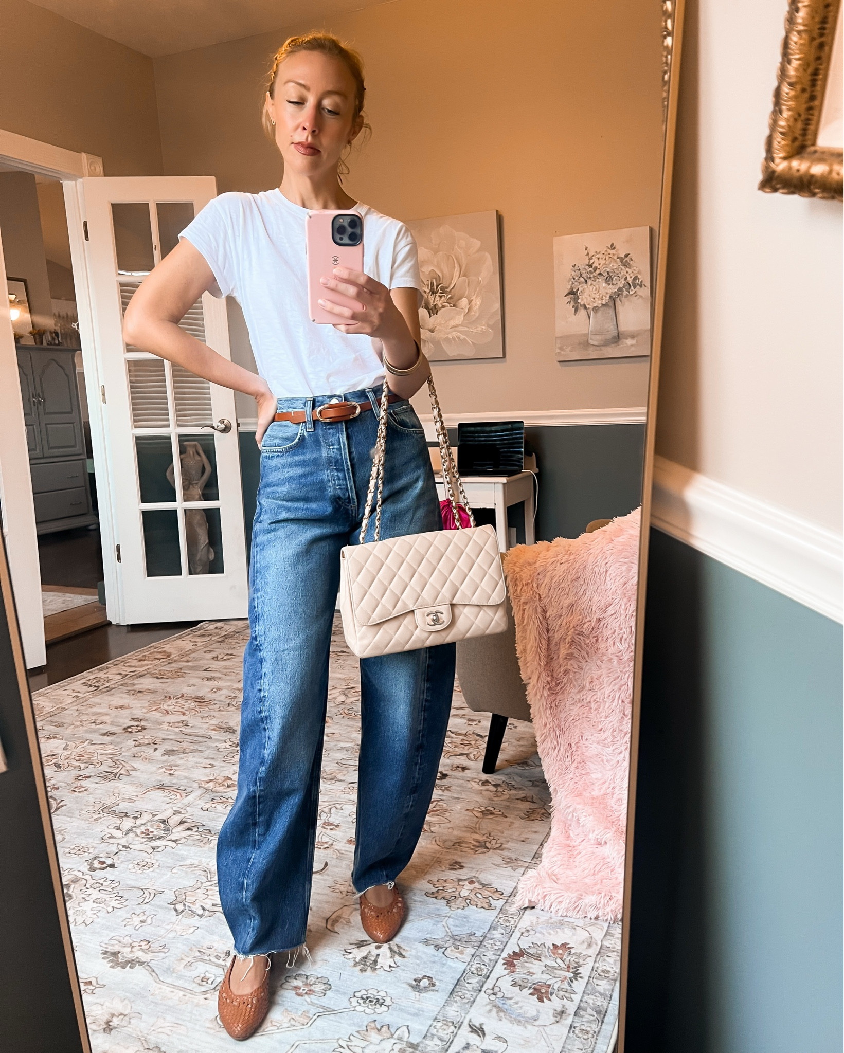 My fave White tee + AGOLDE Luna barrel jeans (I’m in size 25, sized down one from my usual 26). They give the wide-leg look but with a subtle barrel shape that feels modern and flattering. Woven flats, a leather belt, and a cream shoulder bag finish it off.  
Shop the outfit details 

#LTKSeasonal #LTKOver40 #LTKFindsUnder100