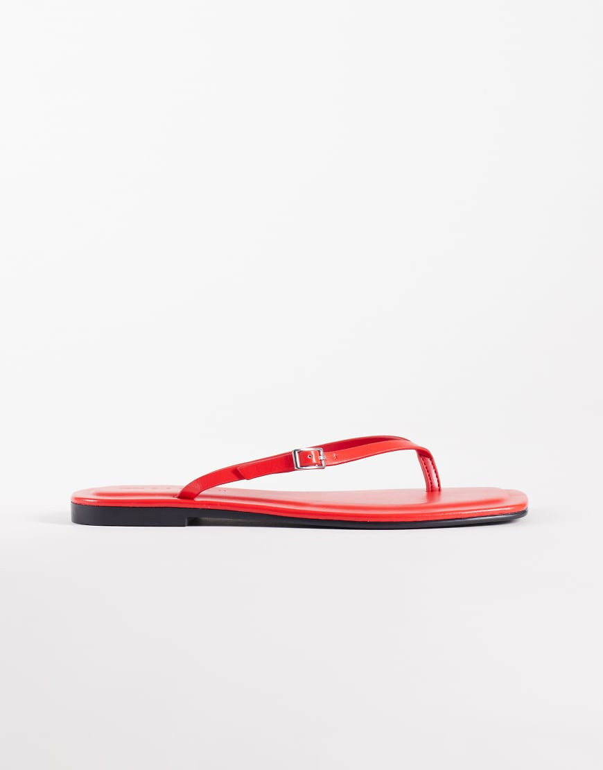 ASOS DESIGN Fitz skinny strap flip flops in red | ASOS (Global)
