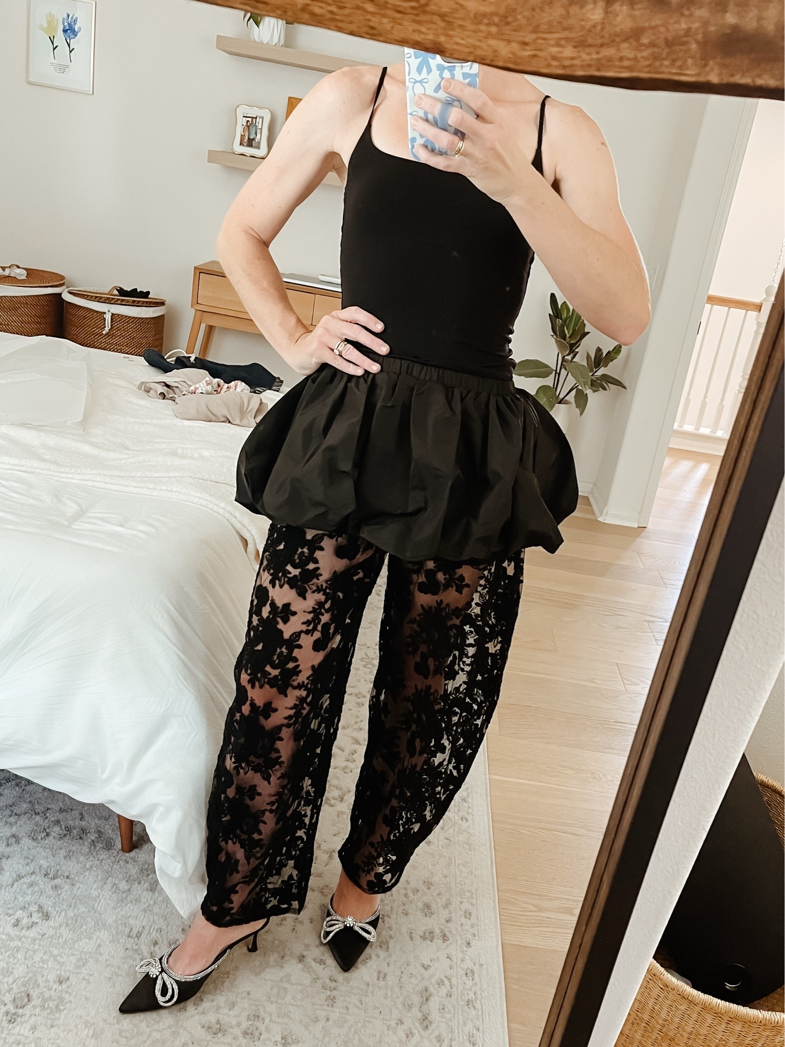 I cannot tell you how beautiful these pants are! The peplum skirt is separate meaning you could take it off these pants and wear them with another pair. The lace pants come with little boy shorts that are also detachable if you want to wear a bodysuit underneath instead. They’re just so versatile and stunning in their design. They will be perfect for the holidays! I’m wearing a 4.