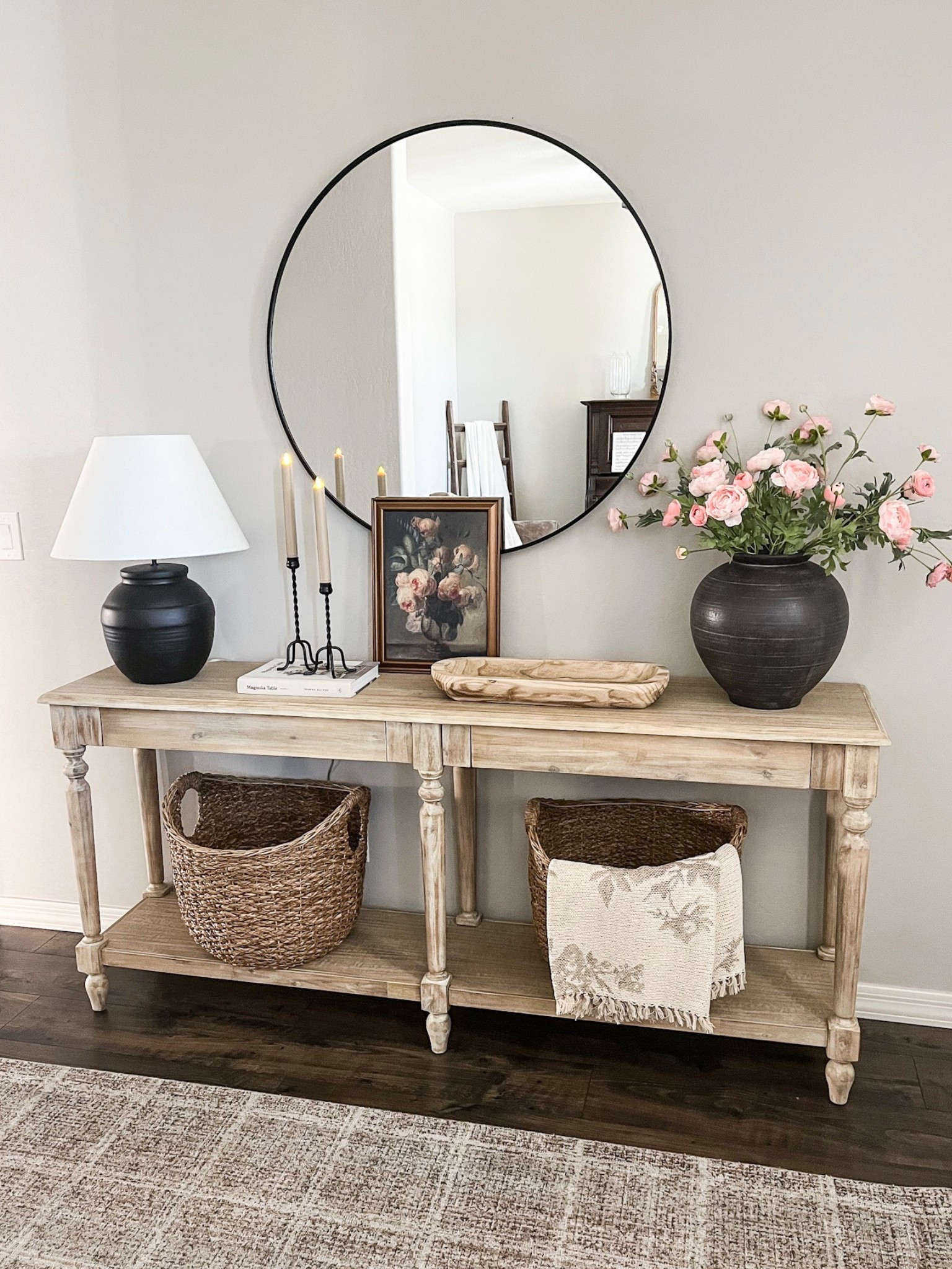 Early spring console styling!

Follow @lifeinmyarizonahome on Instagram for more ideas and inspiration  

Sharing some simple updates to my entryway console as I slowly start bringing in spring.  This beautiful large vase, pink flowers and artwork that coordinate so well together, timeless iron candlesticks, and a neutral throw blanket help complete the look. 

#homedecor #springdecor #homestyling #entrywaydecor 


#LTKHome #LTKSeasonal #LTKSpringSale