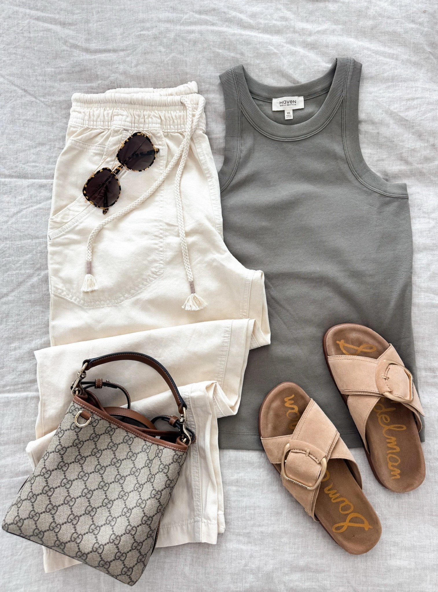 Last year's best seller, like Birks but cuter! Sam Edelman sandals are back in stock

casual everyday summer outfit comfy pants slide on sandals high neck tank top gucci bag sunglasses blushingrosestyle 

#LTKOver40