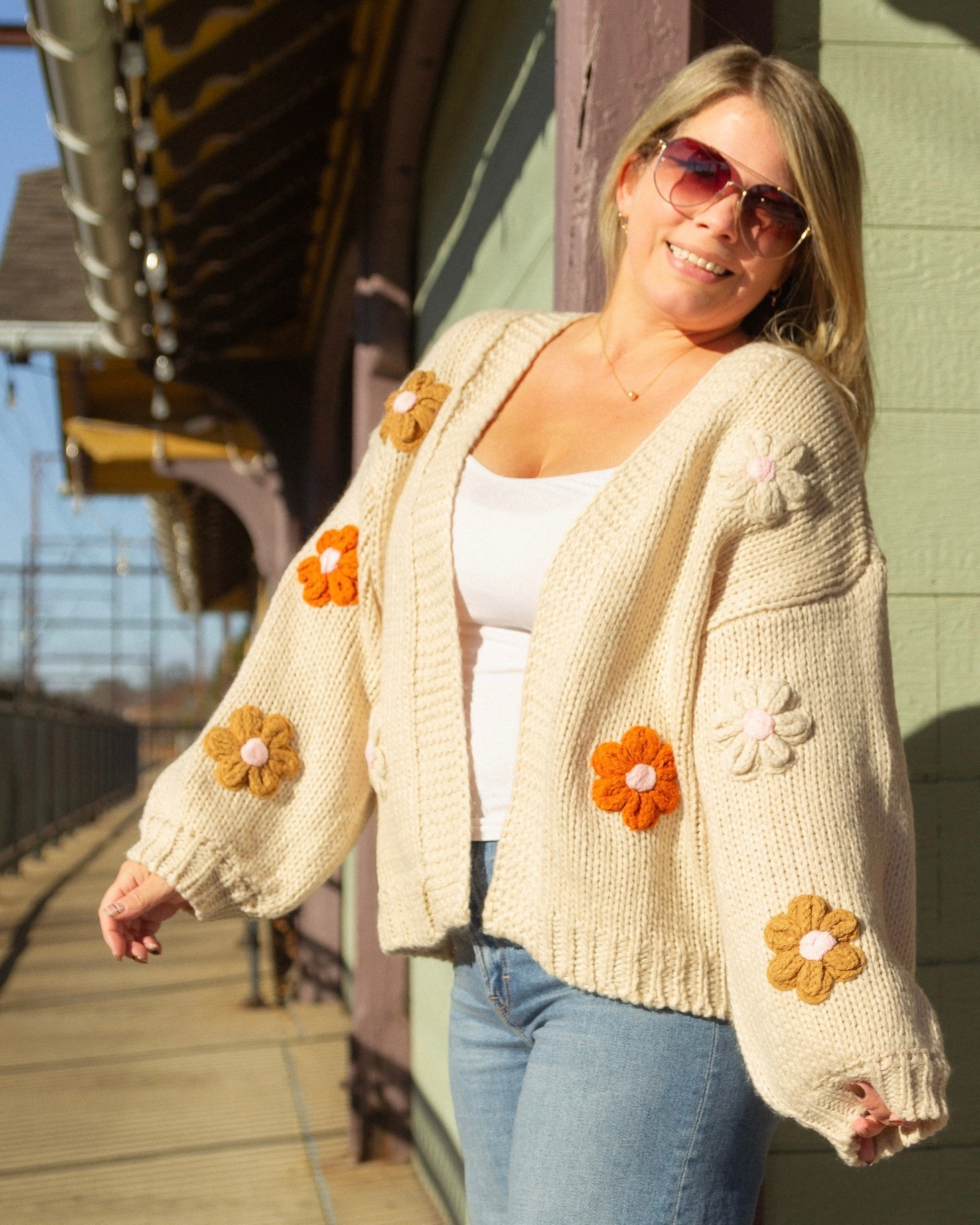 Hello cozy season 🙋🏼‍♀️ meet your new BFF. 🌸 This daisy-detailed oversized knit is giving all the soft + cozy vibes. 

#LTKWorkwear #LTKootd #LTKOver40