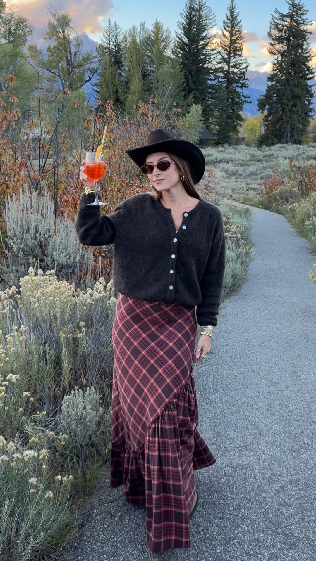 9/28/26 Jackson Hole Welcome Party Outfit 🤠

Leaning all the way into the western dress code for welcome party drinks overlooking the Tetons 🤠🏔️ Linking my Tecovas boots, Free People skirt (size 0), Amazon sunglasses + Overland hat.
My sweater is from American Vintage and unfortunately isn’t linkable, but I’ll add something similar if I can. One of my favorite looks from the entire Jackson Hole trip 🤎

#LTKootd #LTKSeasonal #LTKTravel