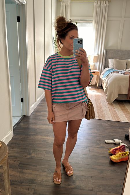 Kind of have a thing for cargo skirts lately 💚🩷 this skirt is actually a skort though & I love it!! Wearing size small (it runs a tad oversized!) wearing a medium in this striped Amazon tee! 

Sandals are Pink Lily & code BrittH20 works! (BrittH30) for memorial weekend!!!

#everydayoutfit #casualoutfit #cargoskirt #cargoskort #summeroutfit #amazon 