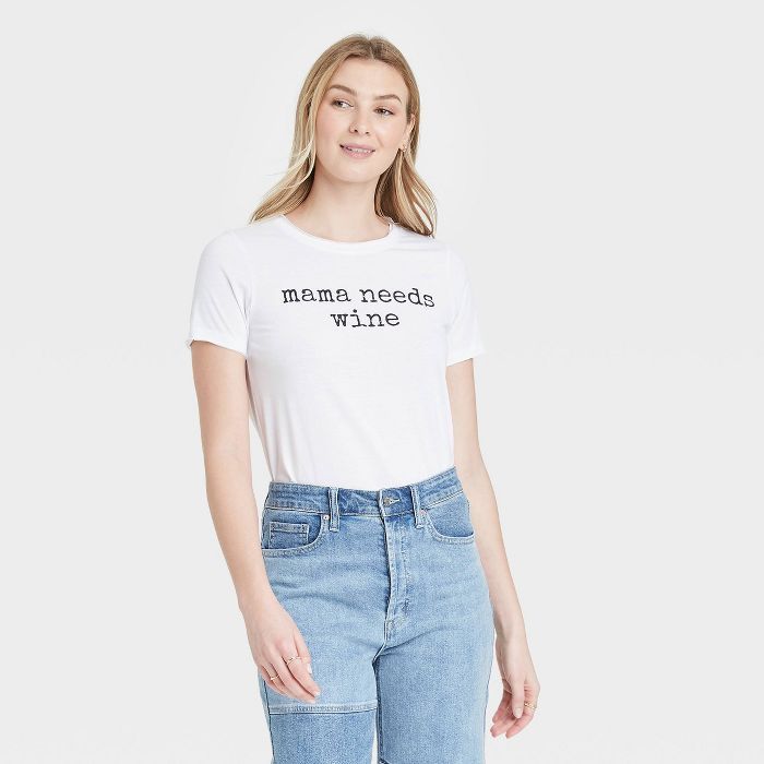 Women's Mother's Day Mama Needs Wine Short Sleeve Graphic T-Shirt - White | Target