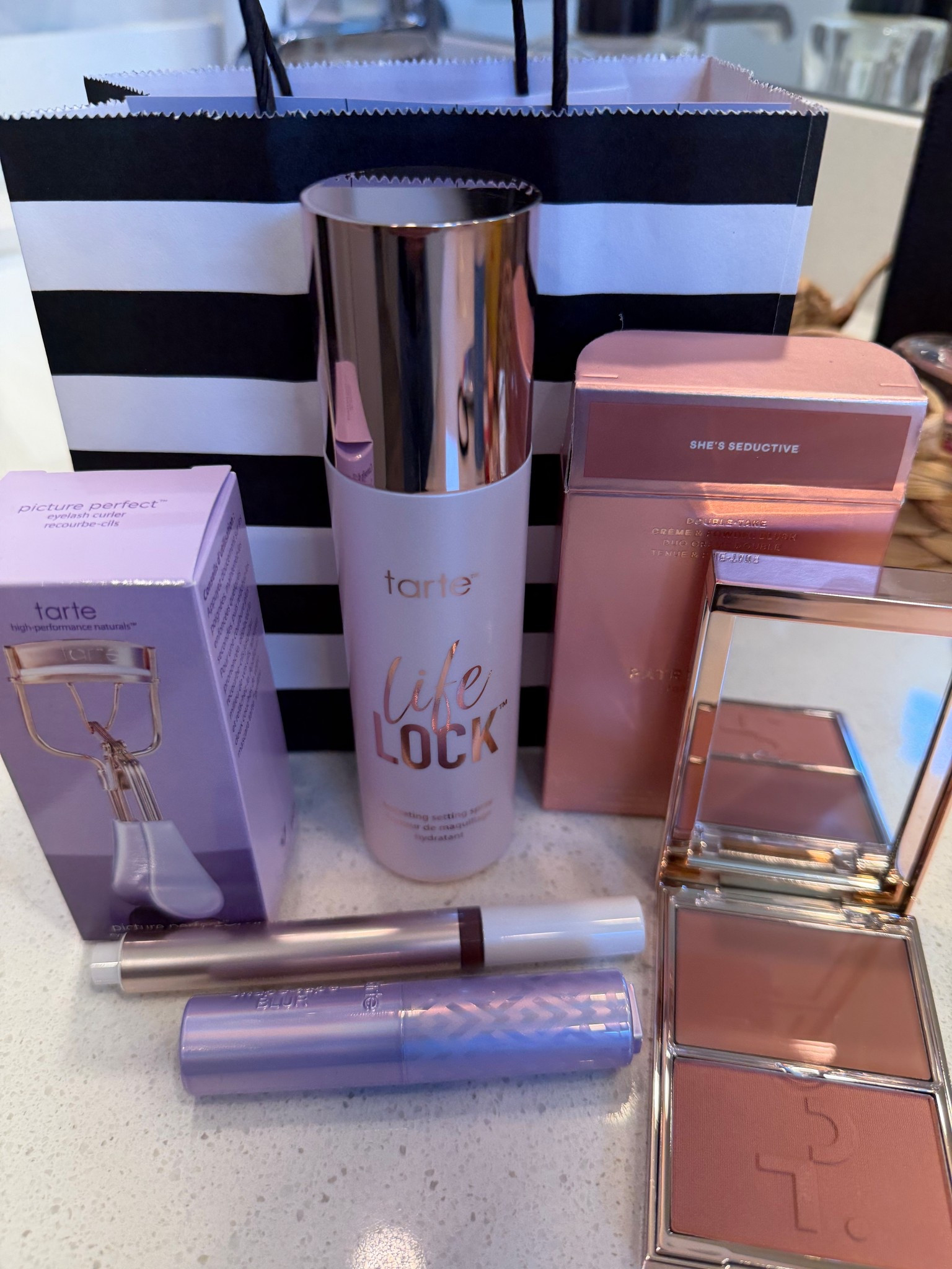 Recent beauty haul new favorites, makeup setting spray, lash curler, plumping lip gloss, creme blush, eye concealer 

#LTKMothersDay #LTKBeauty #LTKmorningroutine