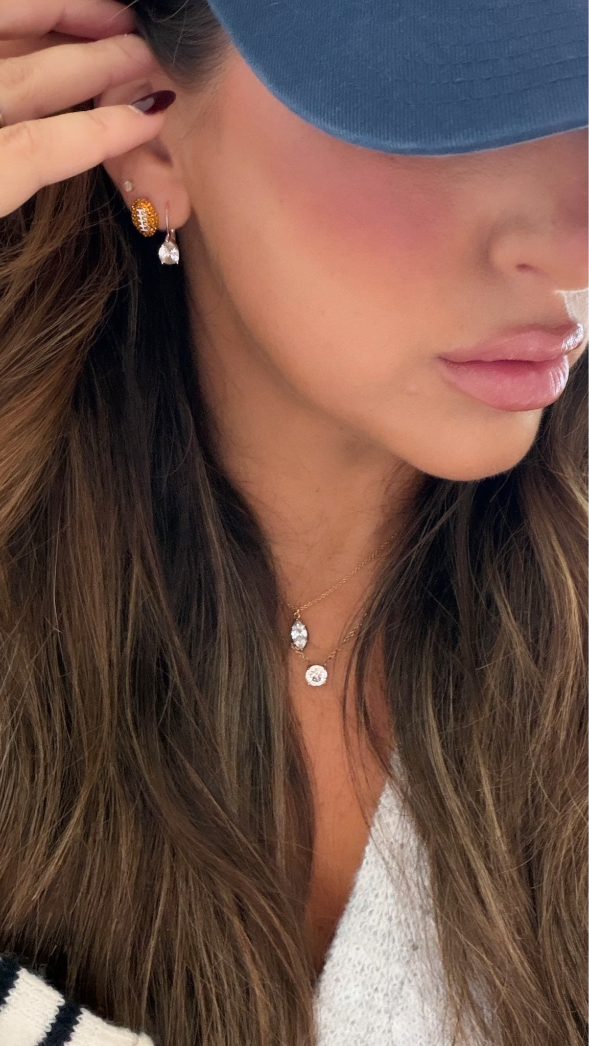 Today’s jewelry. Football earrings. NFL attire

#LTKSeasonal #LTKActive #LTKSaleAlert