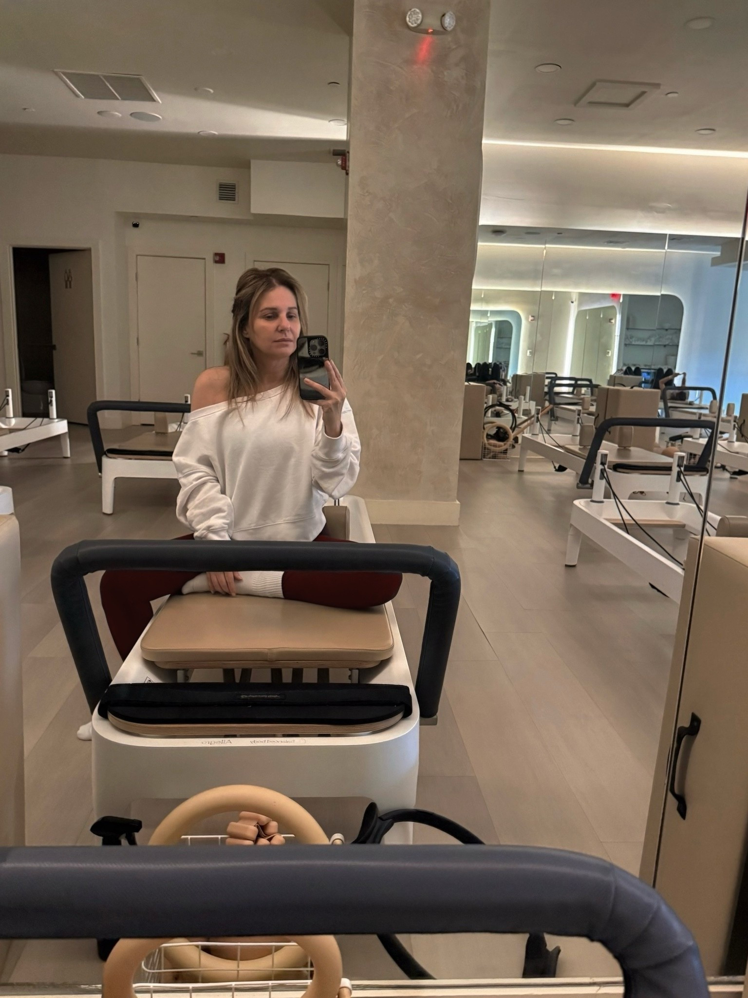 🥱 Early morning pilates, but showed up + did it. Wearing a white off the shoulder sweatshirt from @Spiritual Gangster… sized up from a S to a L for an oversized fit. It’s a great athleisure piece to add to your closet and can be worn w jeans, joggers or as a workout outfit coverup. Burgundy leggings from @lululemon and my white slouchy crew no-slip grip socks (love them) are from Amazon.

#LTKdayinmylife #LTKootd #LTKActive