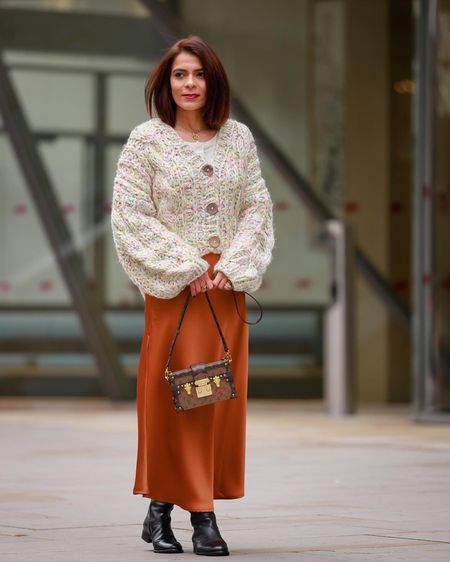 Brown Chunky Cardigan Brown Golden Satin Midi Skirt Black Knee High Boots Simple autumnal outfit Transitional outfit Autumn looks Fall outfit Winter OutfitPetite Style Guide Petite Fashion



#LTKeurope #LTKSeasonal #LTKstyletip