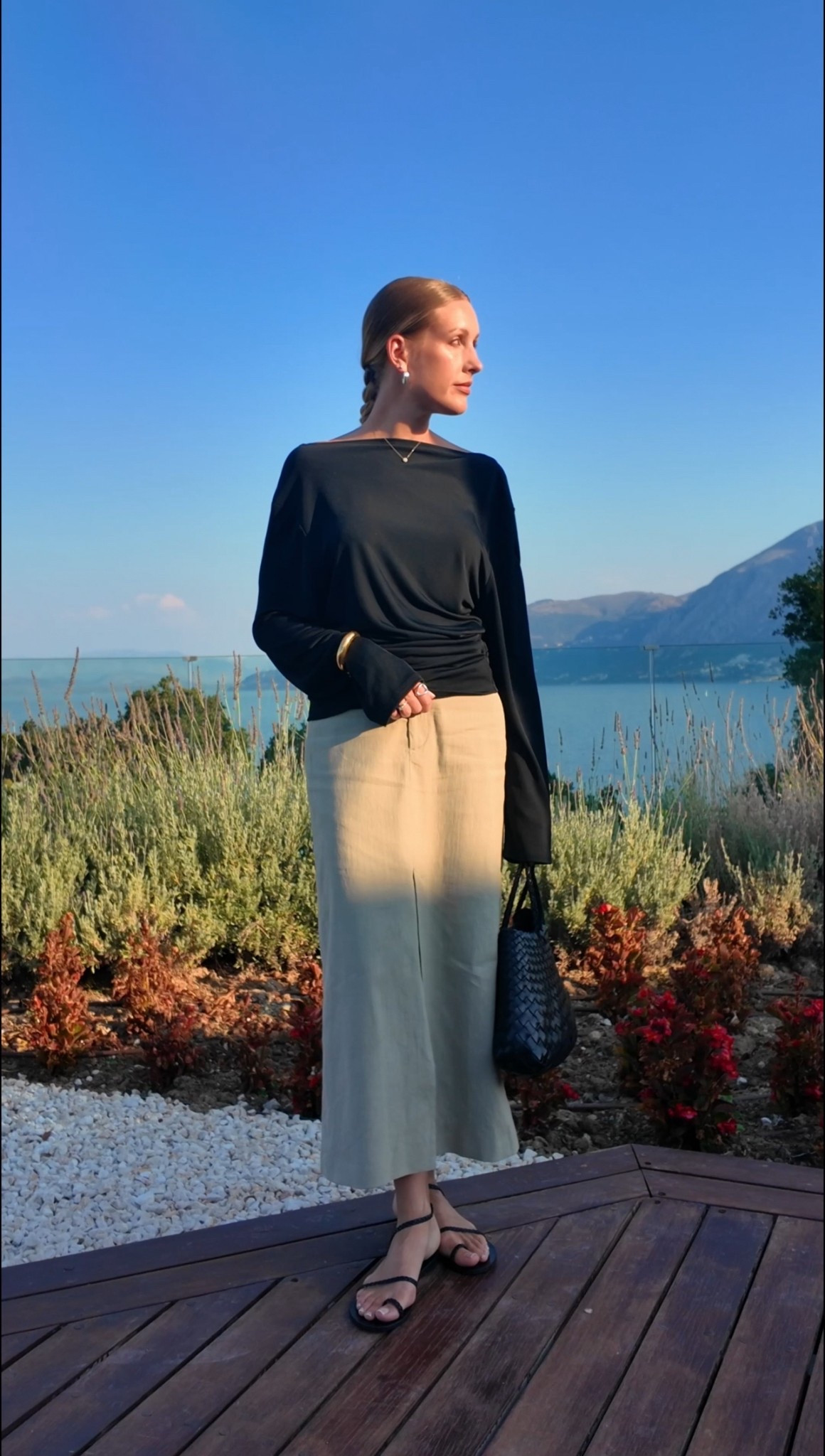 Holiday outfit - summer outfit vacation evening - linen skirt - Arket - Ancient Greek eltheria sandals - Jacquemus backless top - dragon diffusion Santa croc tote small - silver ear cuff and silver hoop earrings - ninety percent ruched top

#LTKsummer #LTKeurope #LTKdatenight